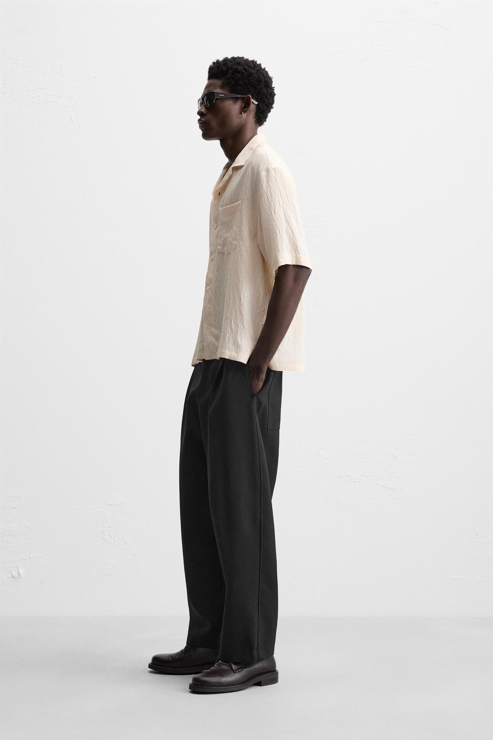 HEATHERED RIPPED EFFECT SWEATER Product Image