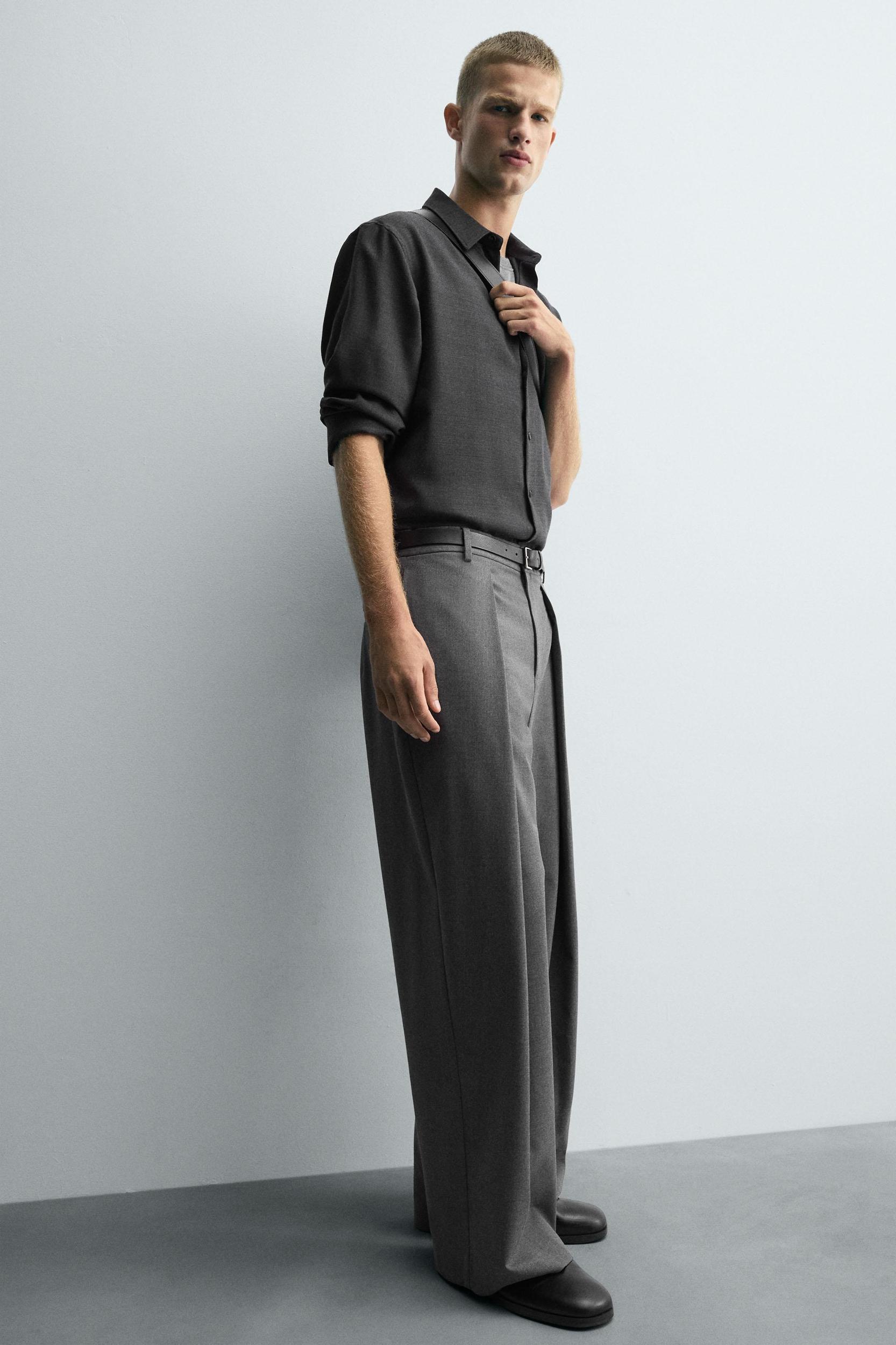 PLEATED WIDE FIT PANTS Product Image
