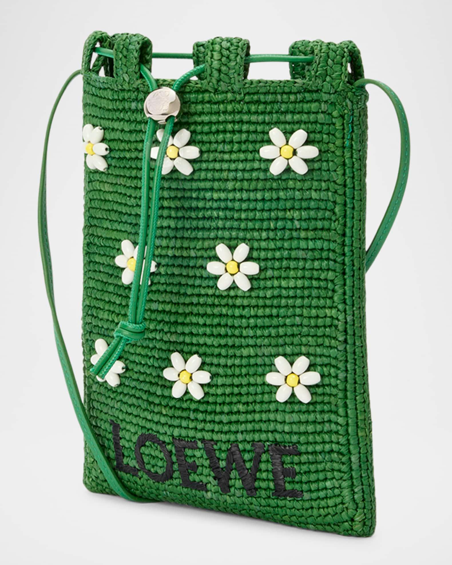 x Paula’s Ibiza Drawstring Pocket Flower Crossbody Bag in Raffia Product Image