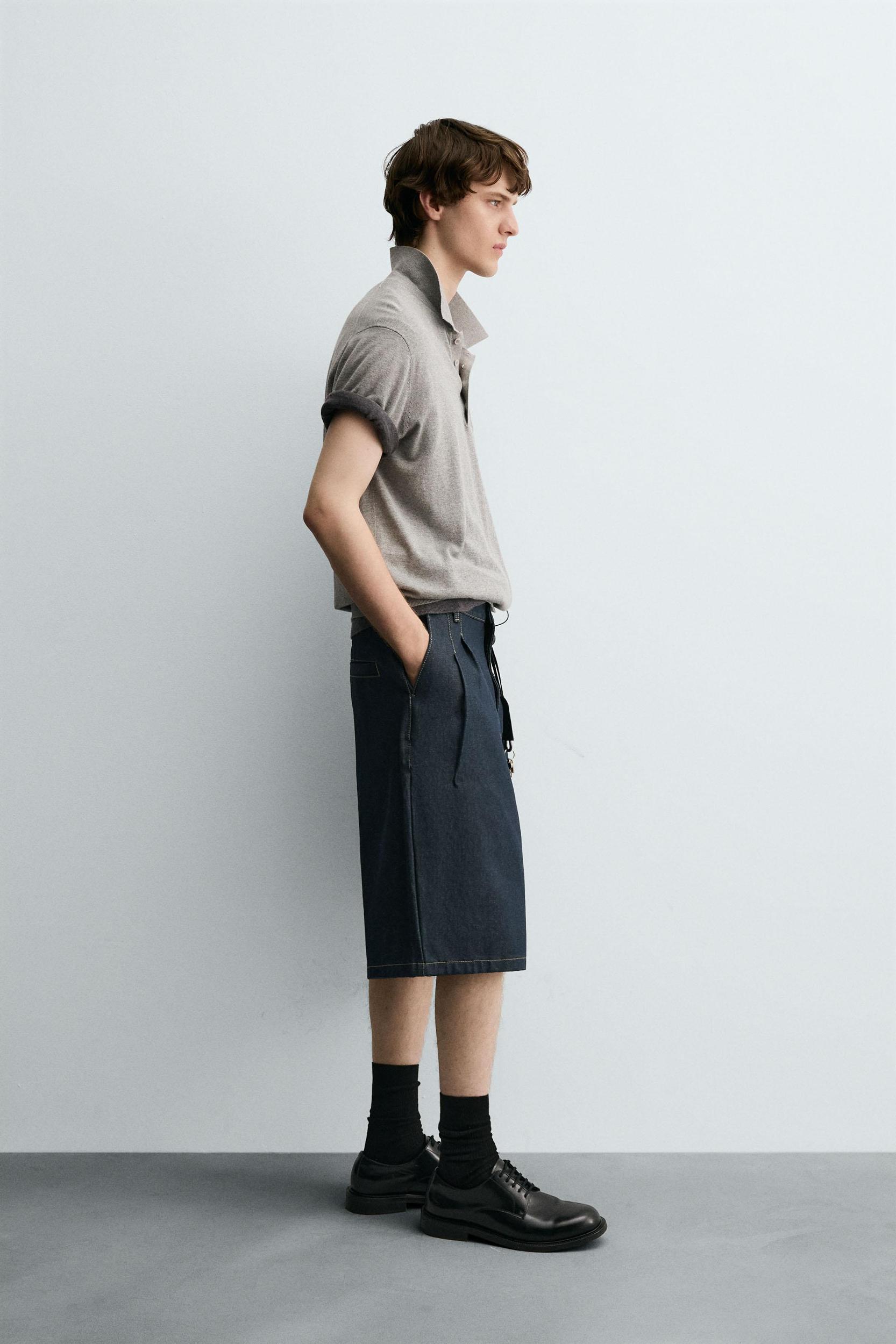 RELAXED FIT PLEATED DENIM SHORTS Product Image