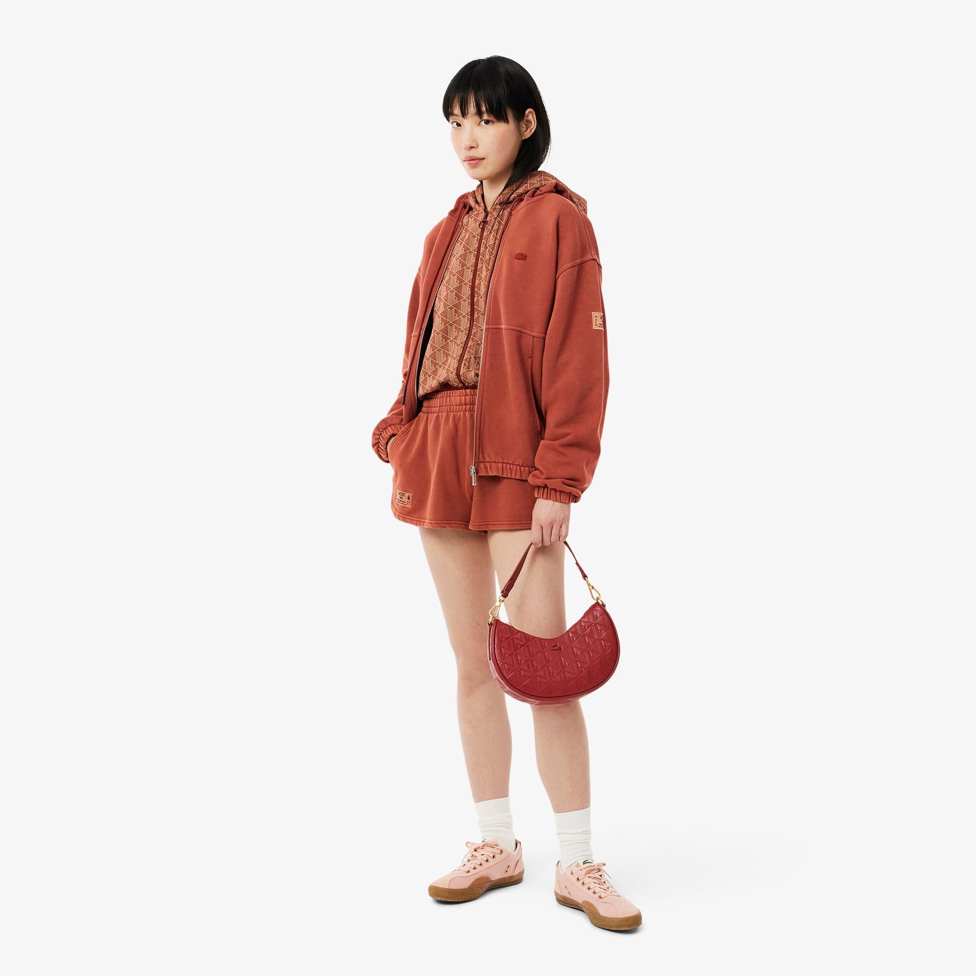 Maheki Embossed Leather Half Moon Purse Product Image