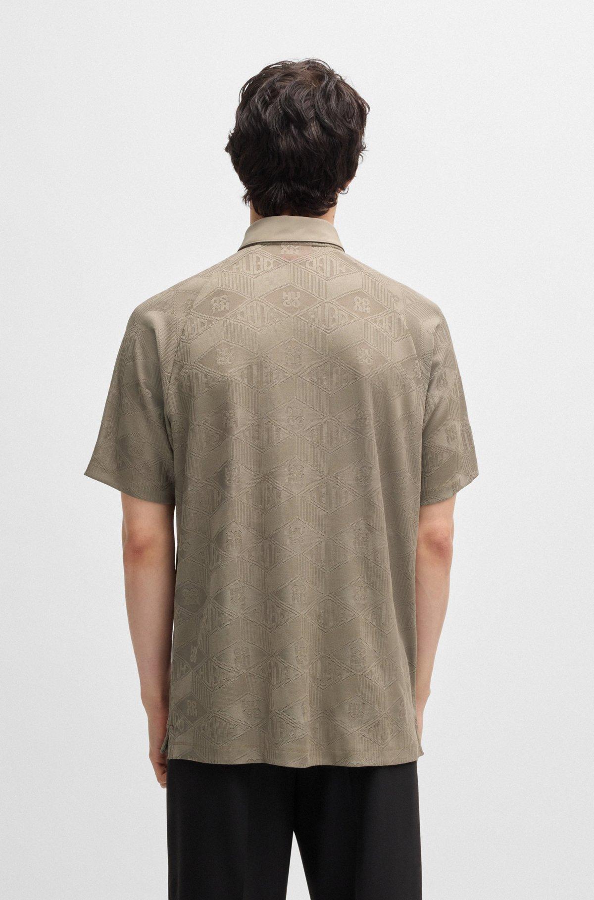 Logo-pattern polo shirt with contrast placket Product Image