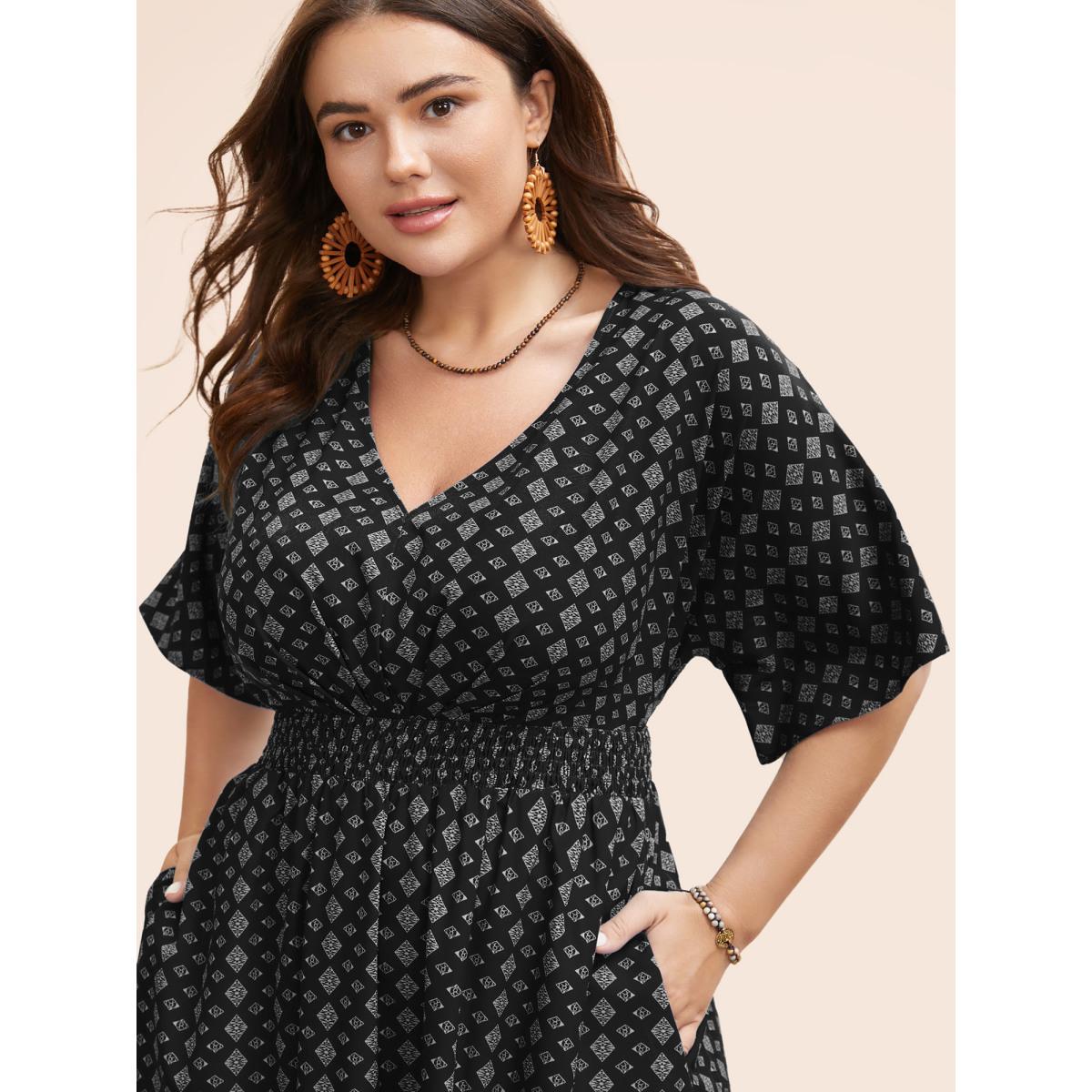 Plus Size Boho Print Shirred Pleated Dolman Sleeve Dress BlackFlower Women Resort Pleated V-neck Half Sleeve Curvy BloomChic 14-16/1X Product Image