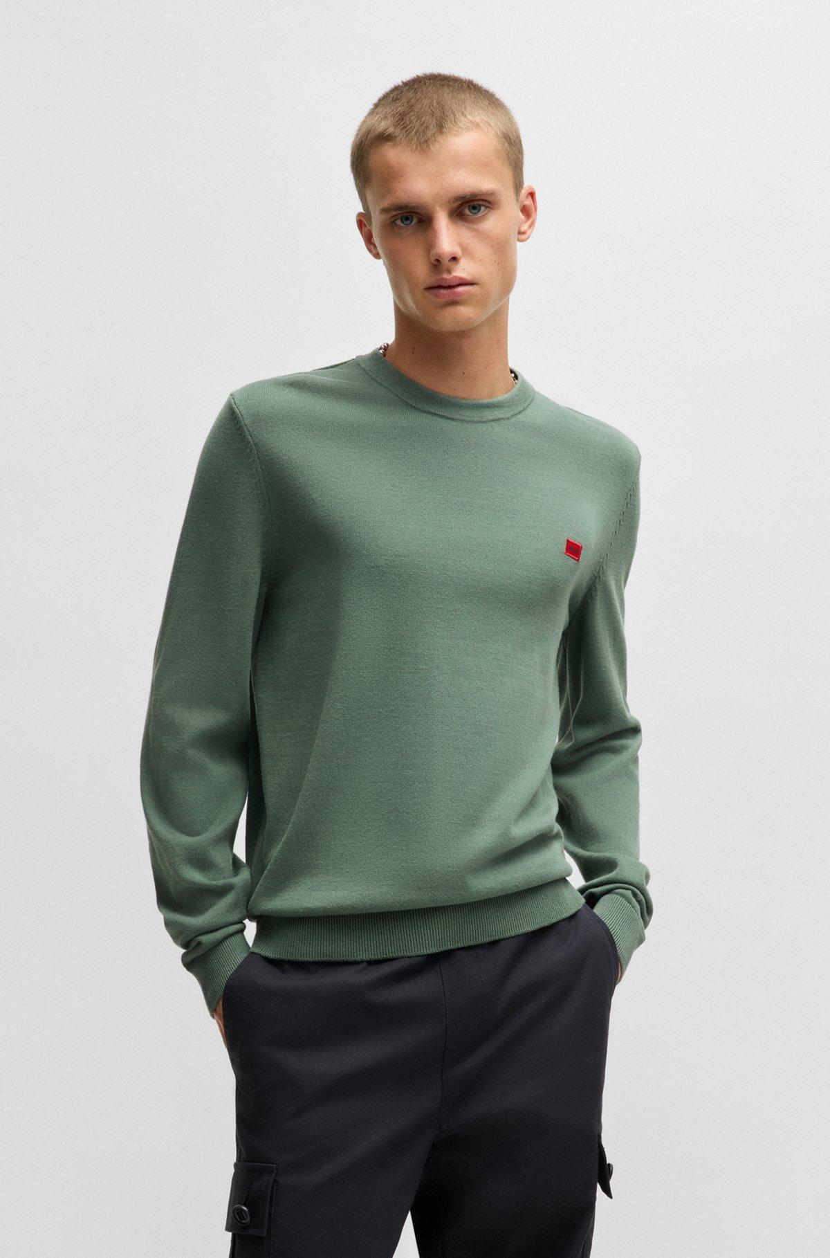 Cotton sweater with red logo label Product Image