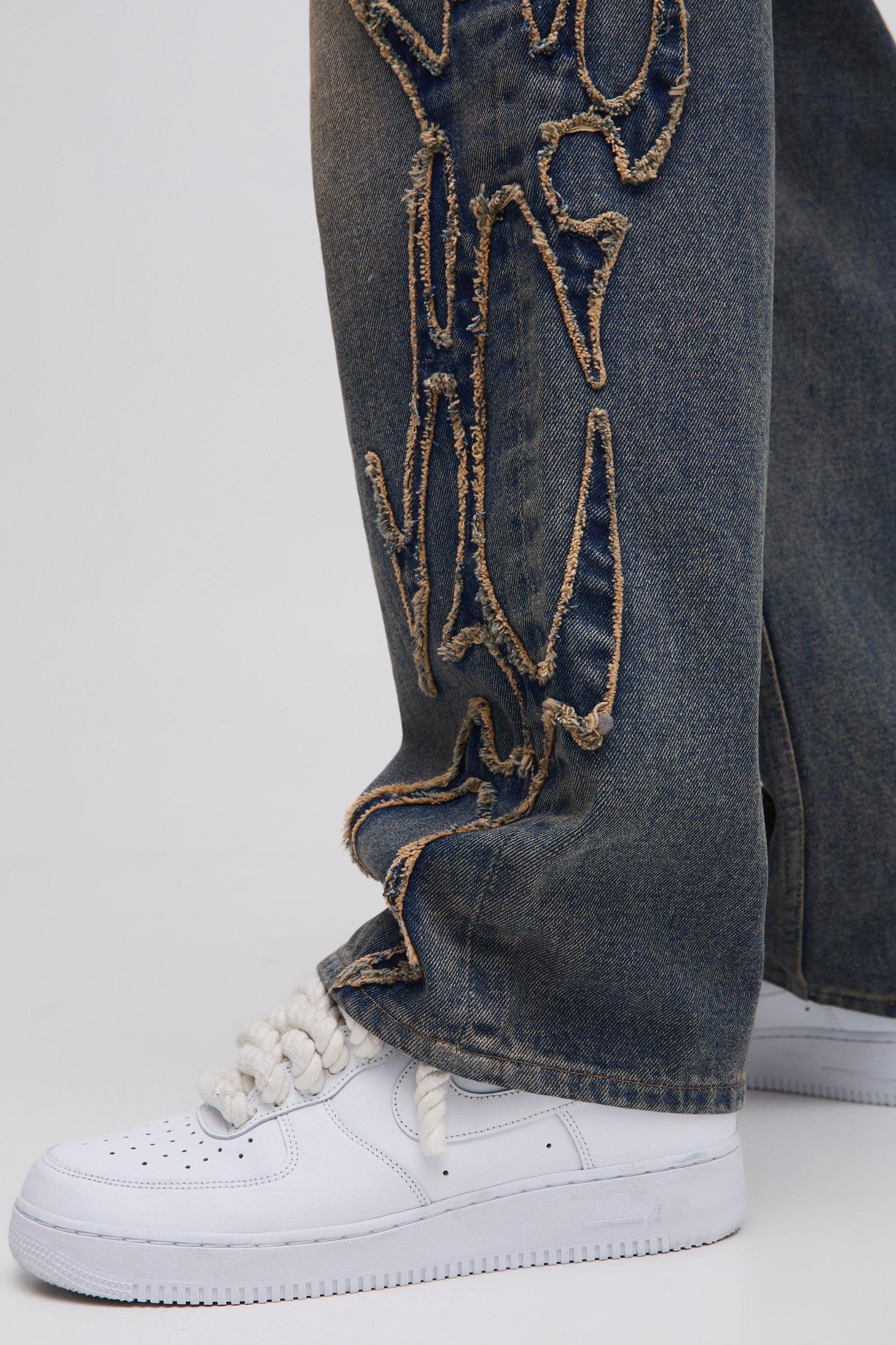 Relaxed Fit Stone Washed Tribal Applique Jeans | boohooMAN USA Product Image