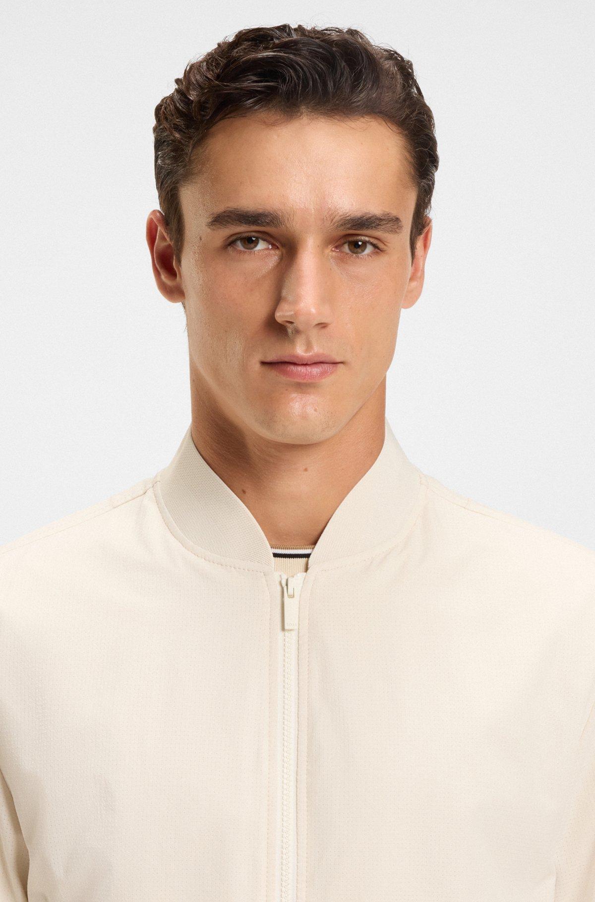 Water-repellent packable jacket with two-way zip Product Image