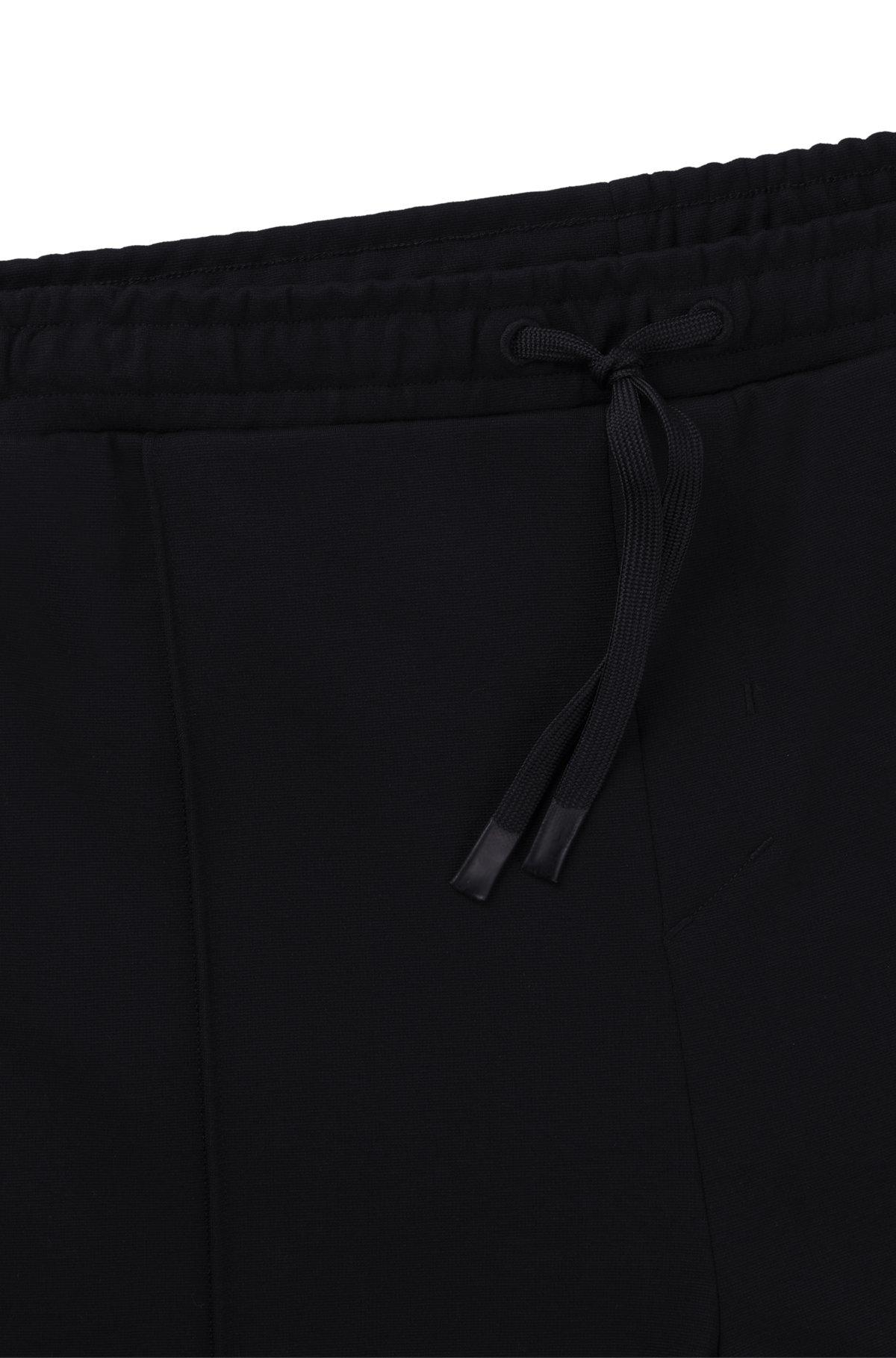 BOSS - Cotton tracksuit bottoms with Double B monogram - Black Product Image