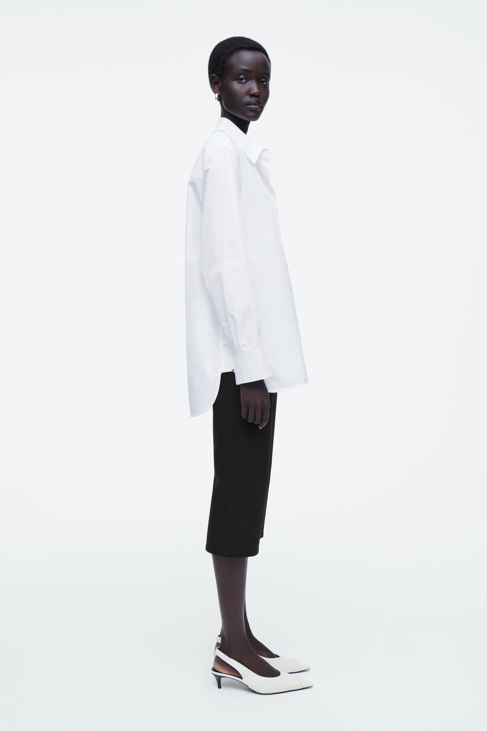 PERFORATED LEATHER SLINGBACK HEELS Product Image