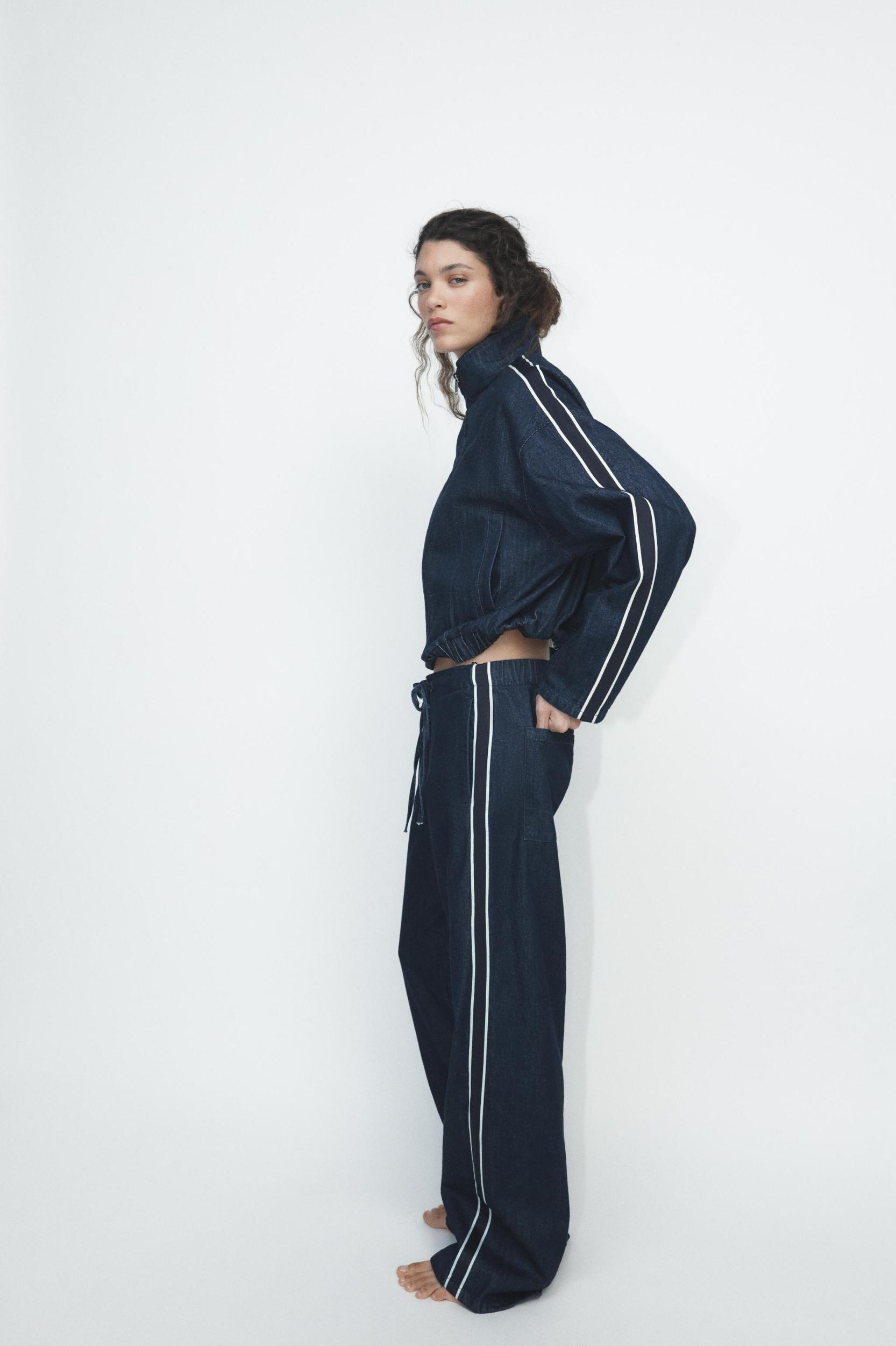 DENIM PANTS WITH SIDE BANDS Product Image