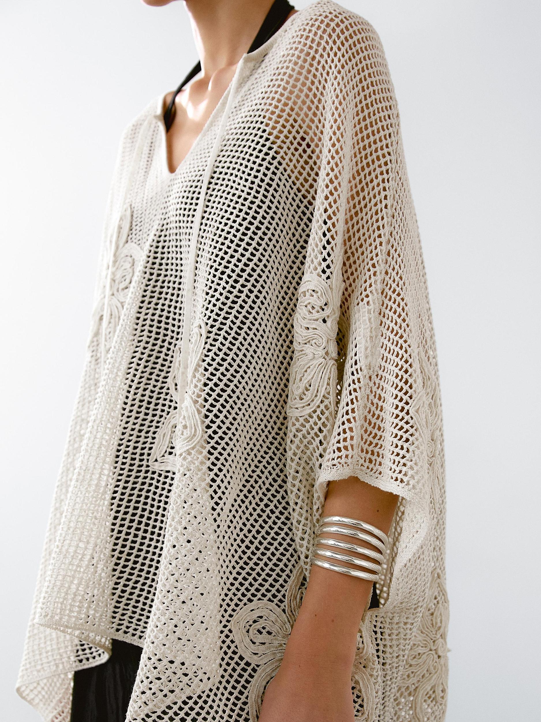 Embroidered cutwork cape Product Image