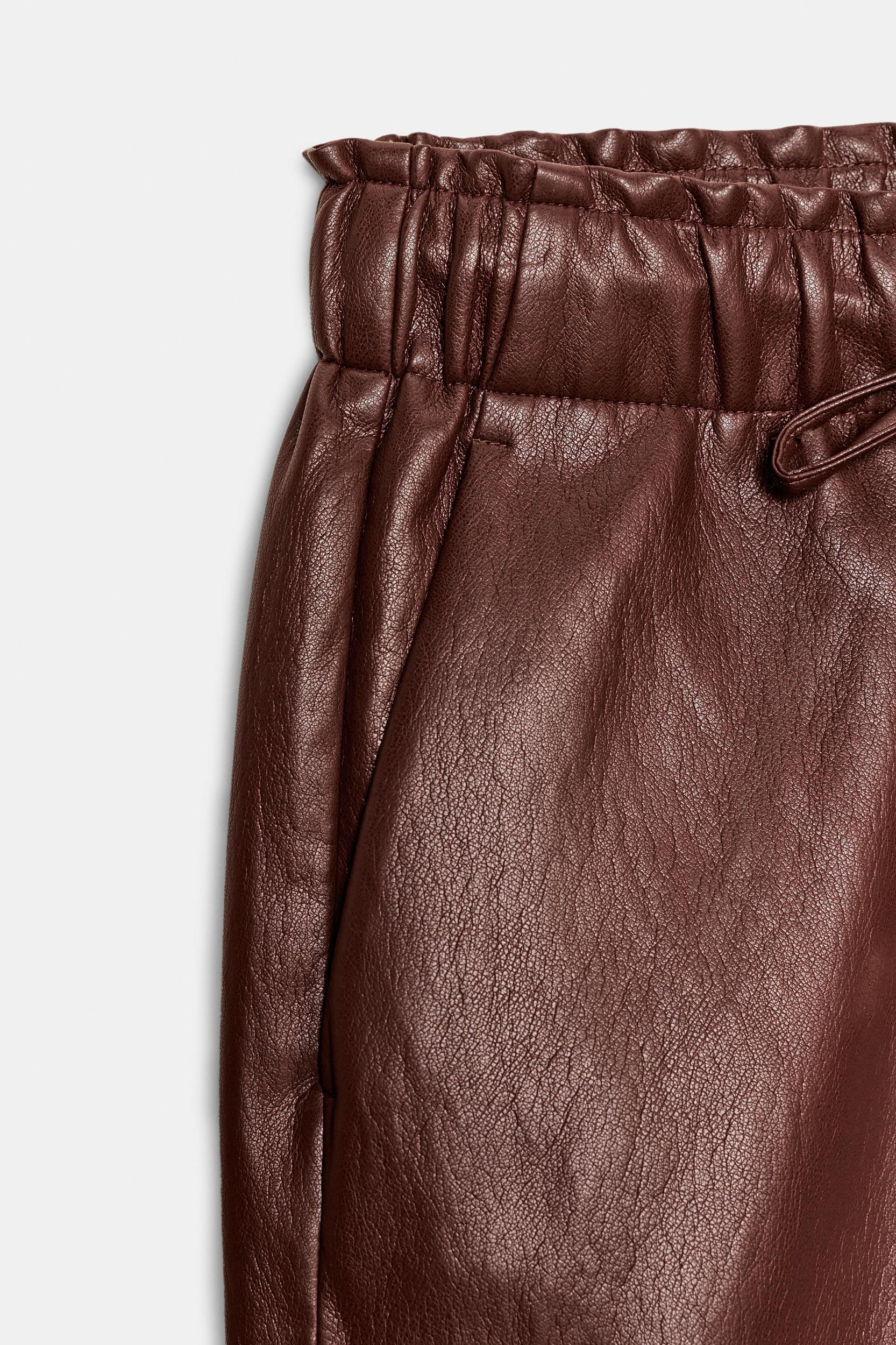 FAUX LEATHER ELASTIC WAIST PANTS Product Image