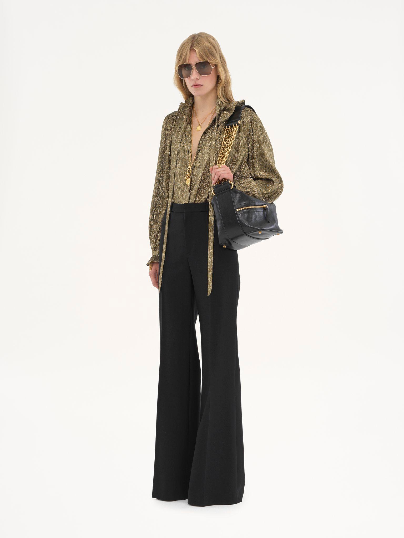 Flared tailored pants in wool grain de poudre Product Image