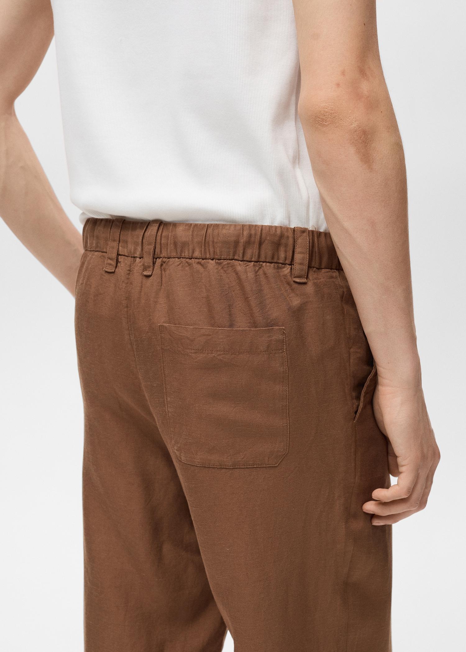 Linen-blend pants with an elastic waistband - Men | MANGO USA Product Image