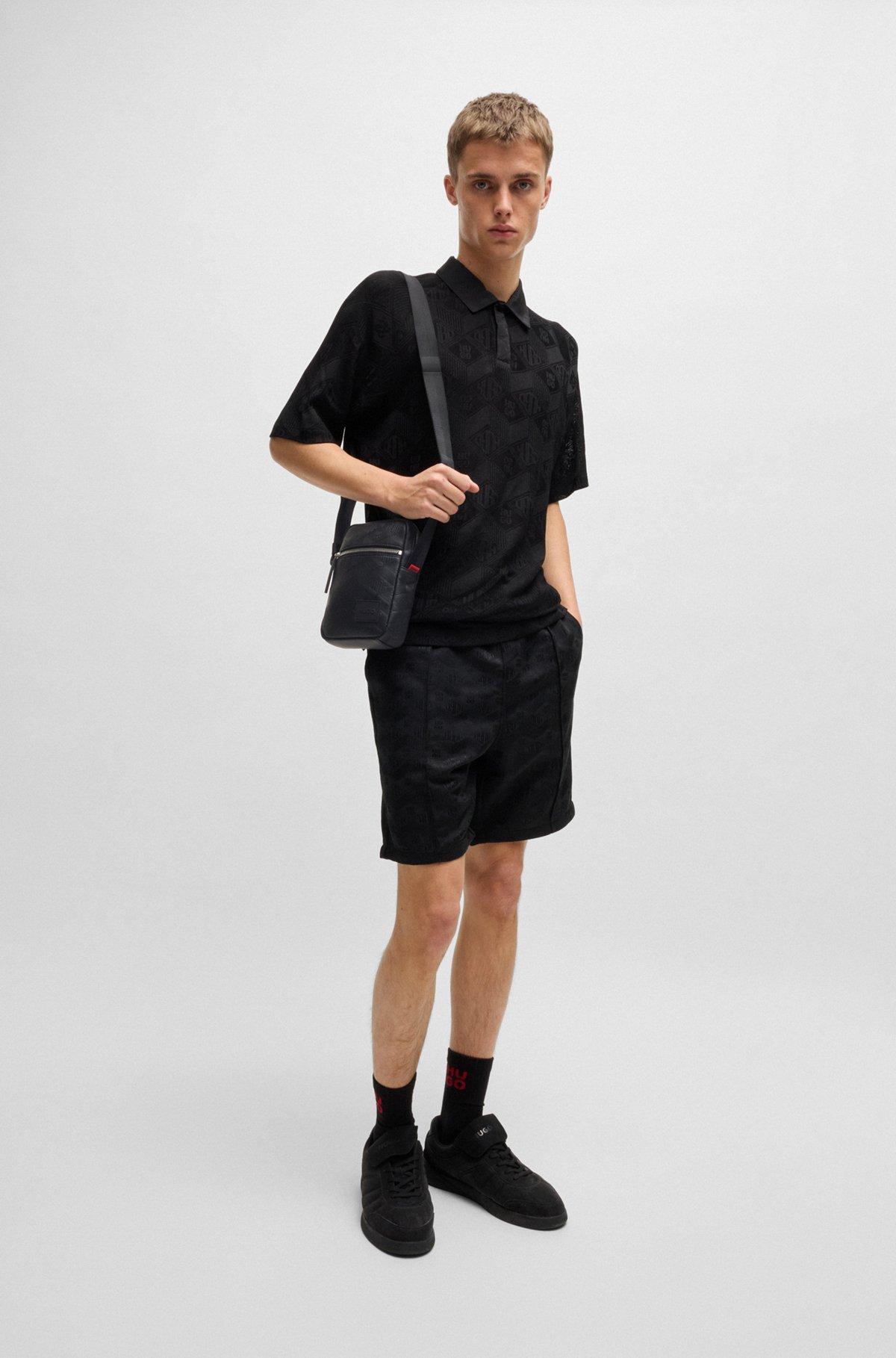 HUGO - Faux-leather reporter bag with stacked and geometric logos - Black Product Image