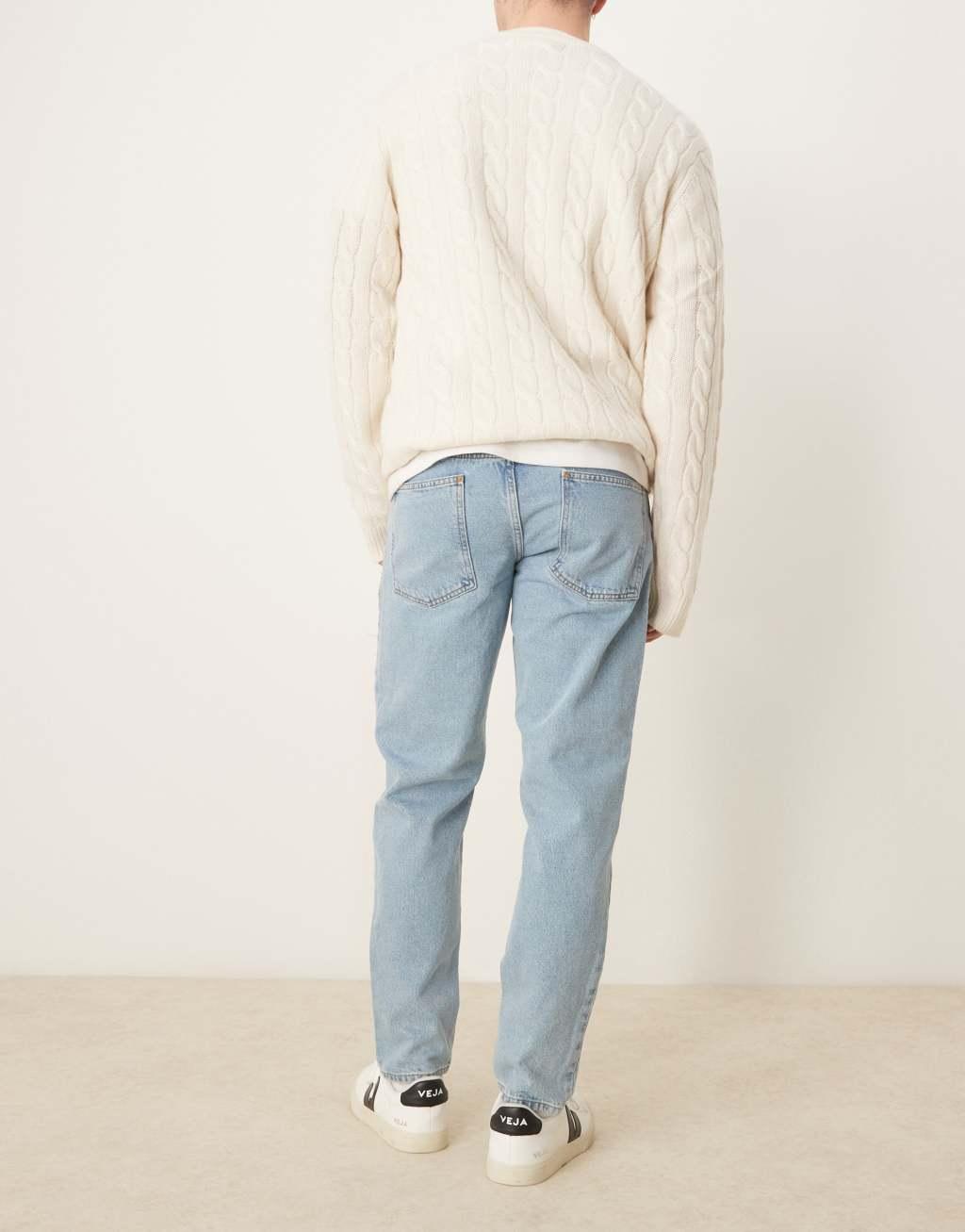 ASOS DESIGN tapered fit jeans in mid wash blue   Product Image