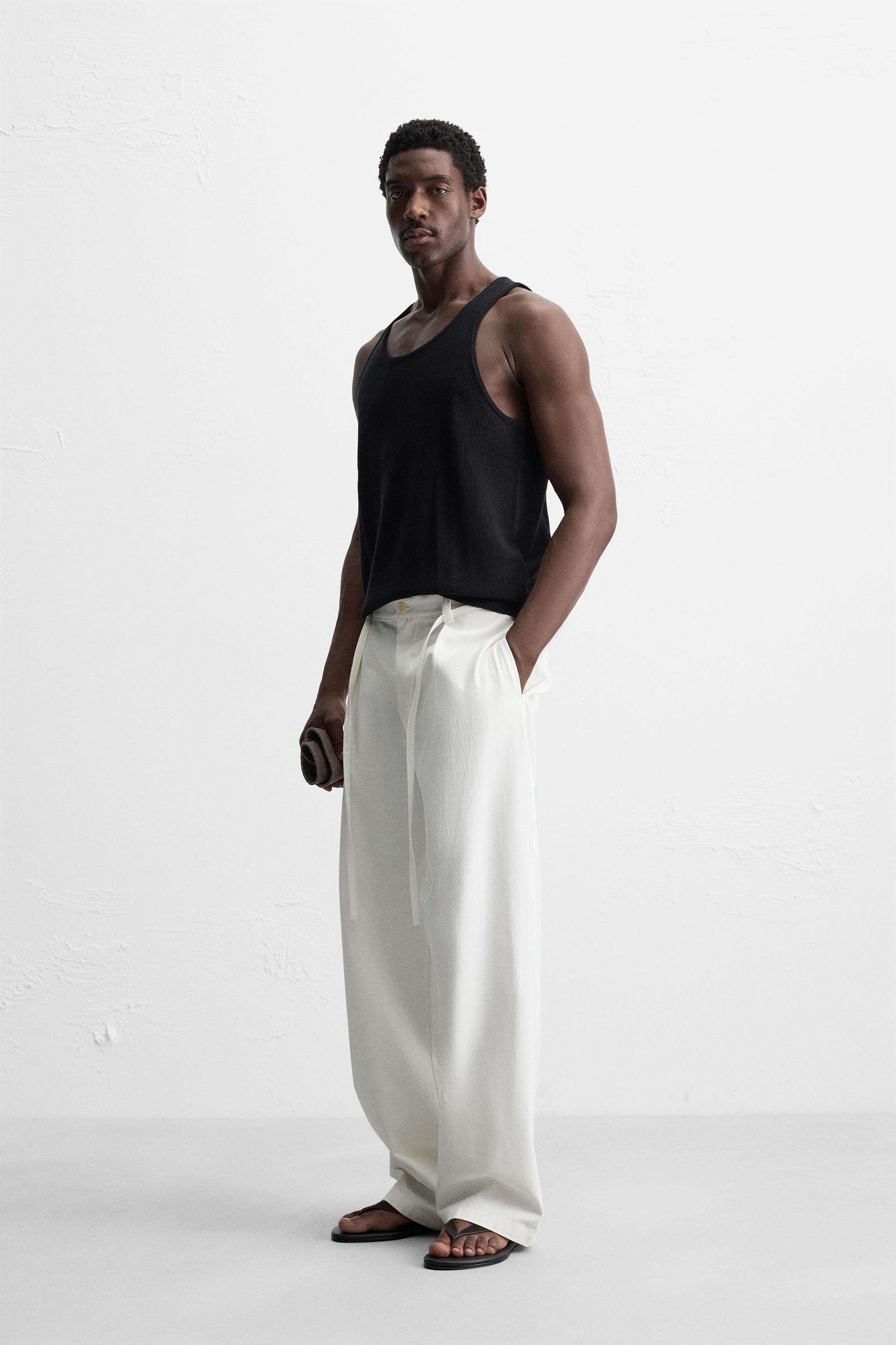 RELAXED FIT PLEATED PANTS Product Image