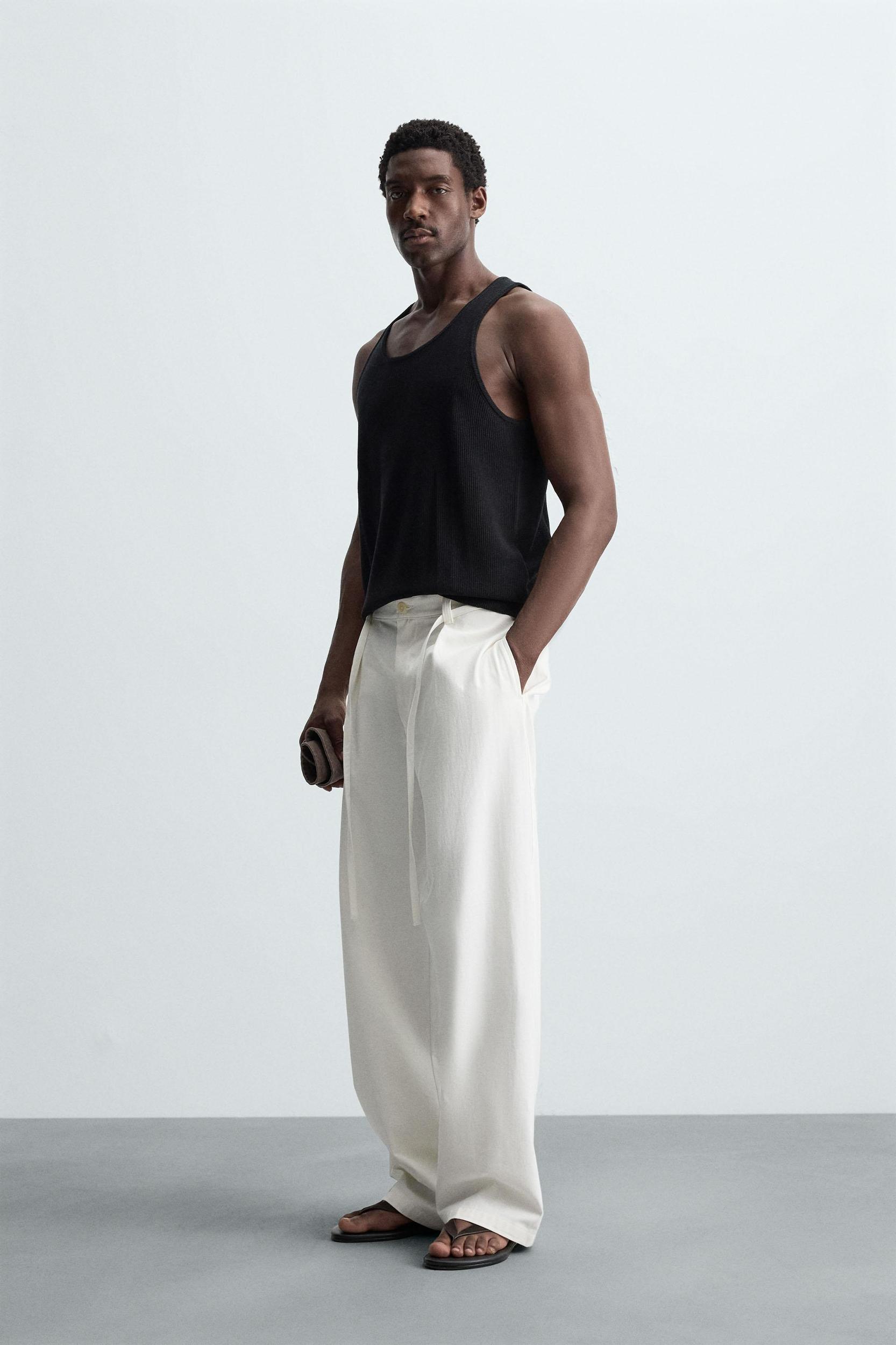 RELAXED FIT PLEATED PANTS Product Image