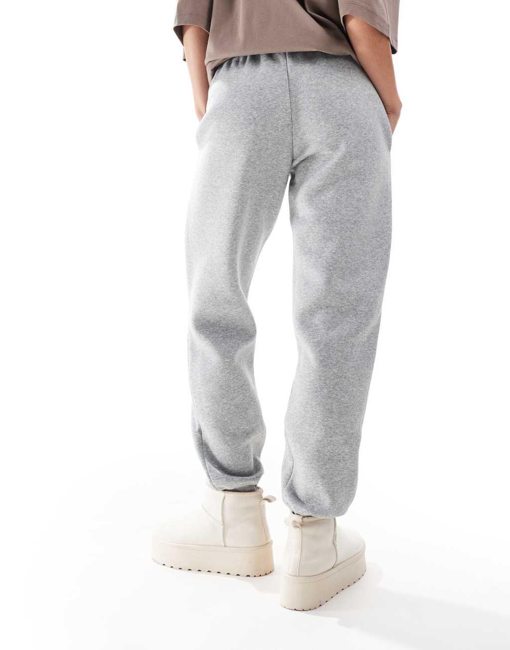 Nike Phoenix Fleece cuffed sweatpants in gray Product Image