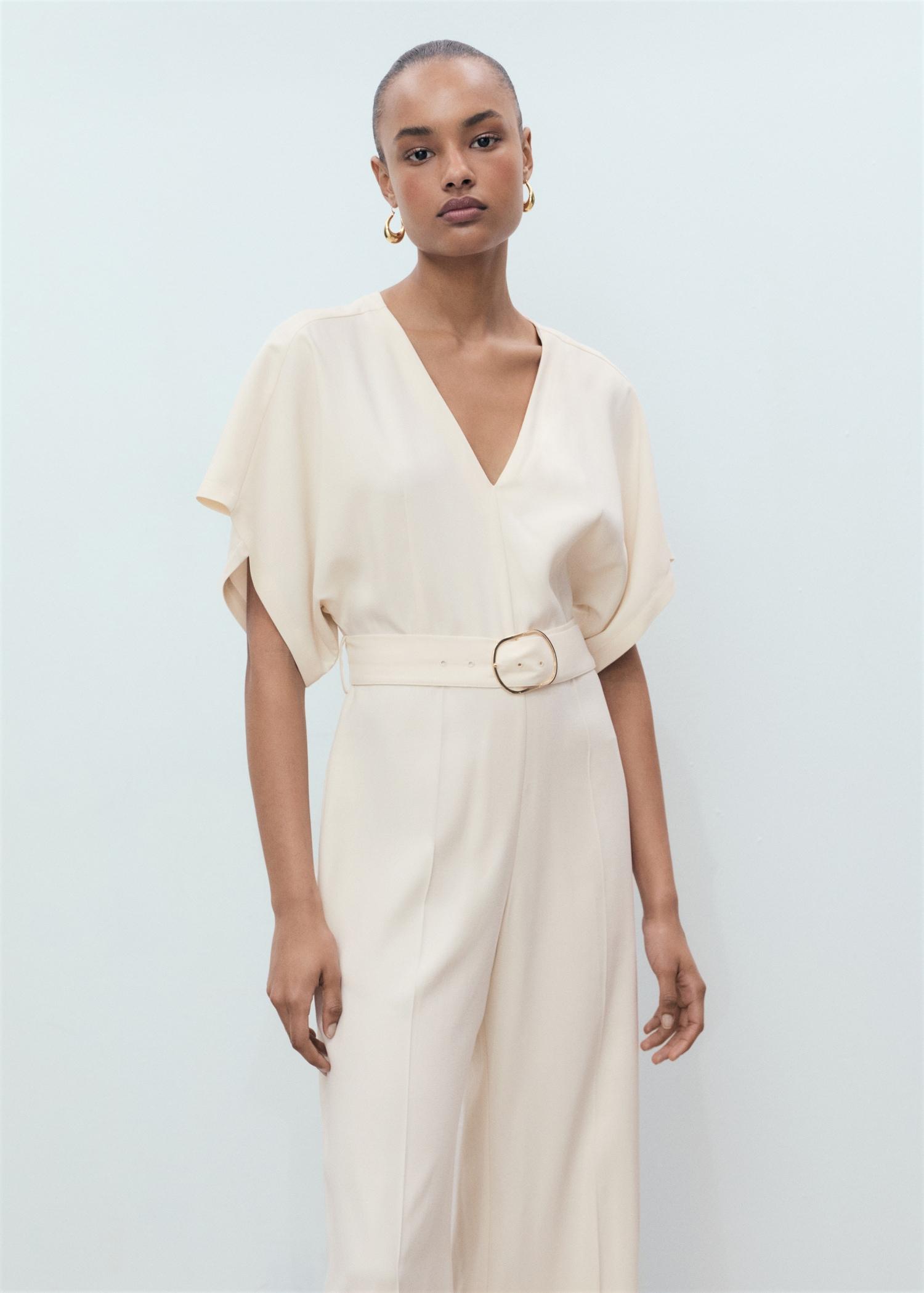 Long jumpsuit with belt and buckle - Women | MANGO USA Product Image