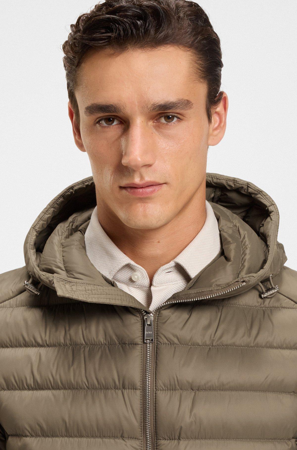 Padded jacket in water-repellent fabric with detachable hood Product Image