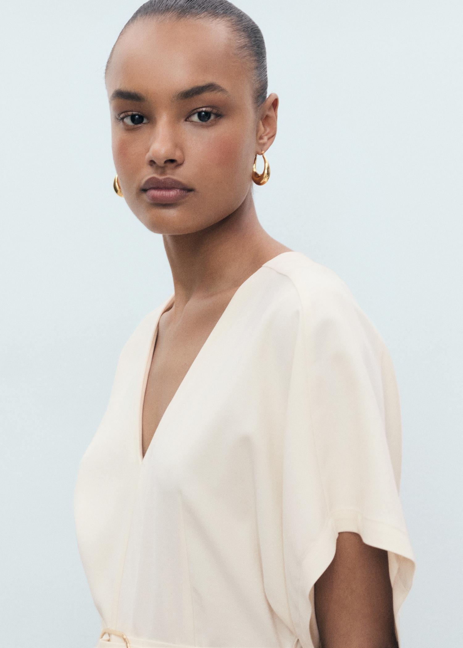 Long jumpsuit with belt and buckle - Women | MANGO USA Product Image