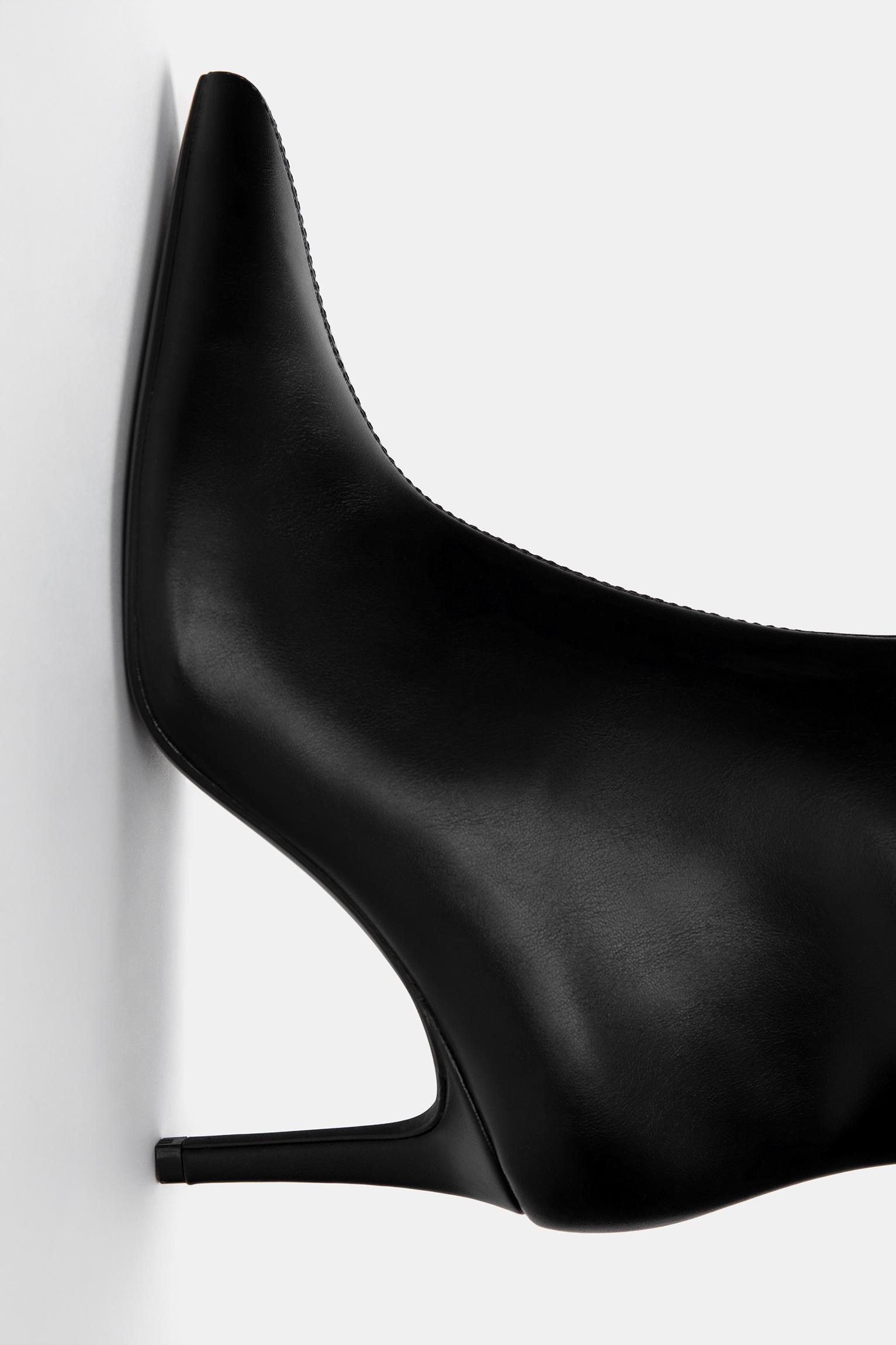 Stiletto heel knee-high boots Product Image