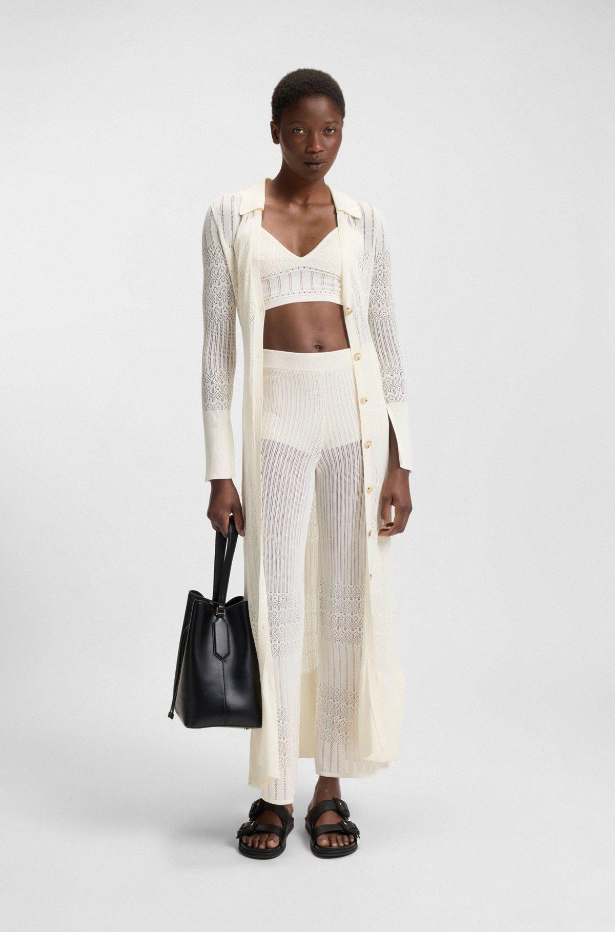 Knitted top in stretch fabric with mixed structures Product Image