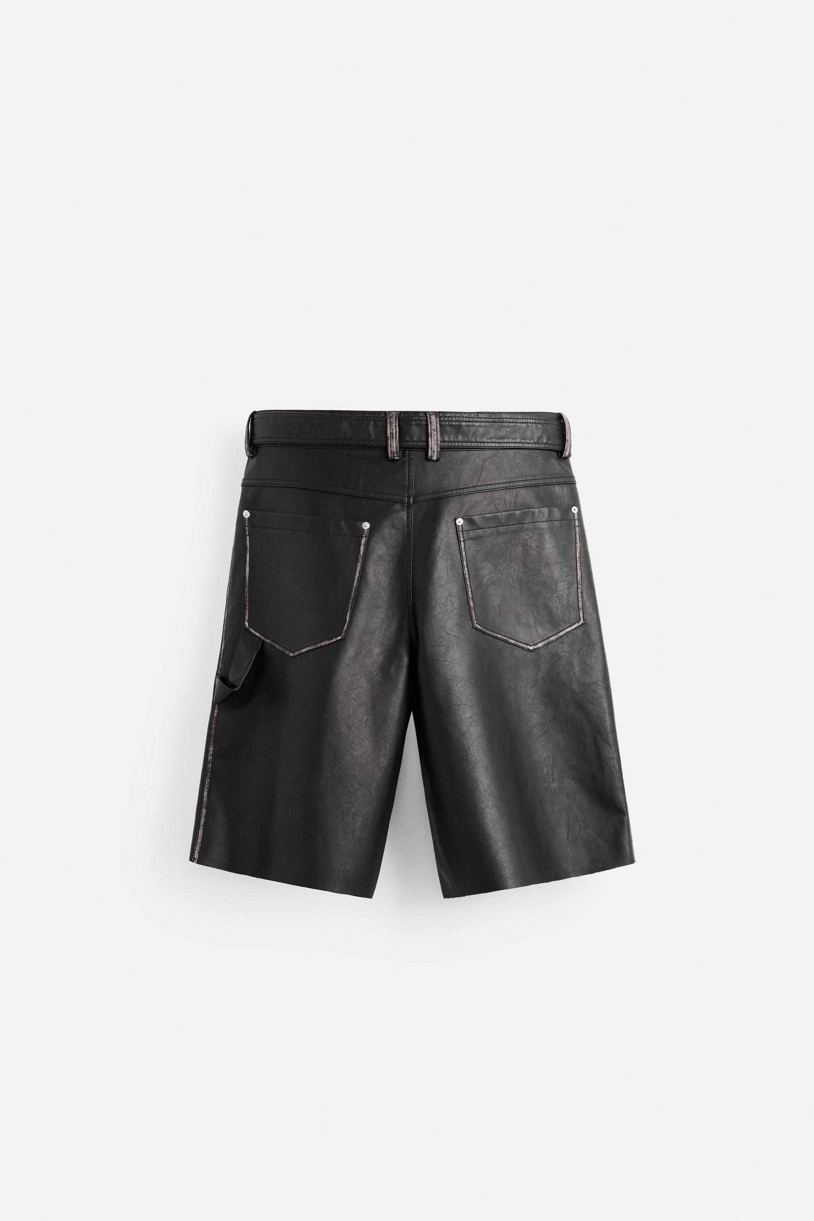 FAUX LEATHER BELTED SHORTS Product Image