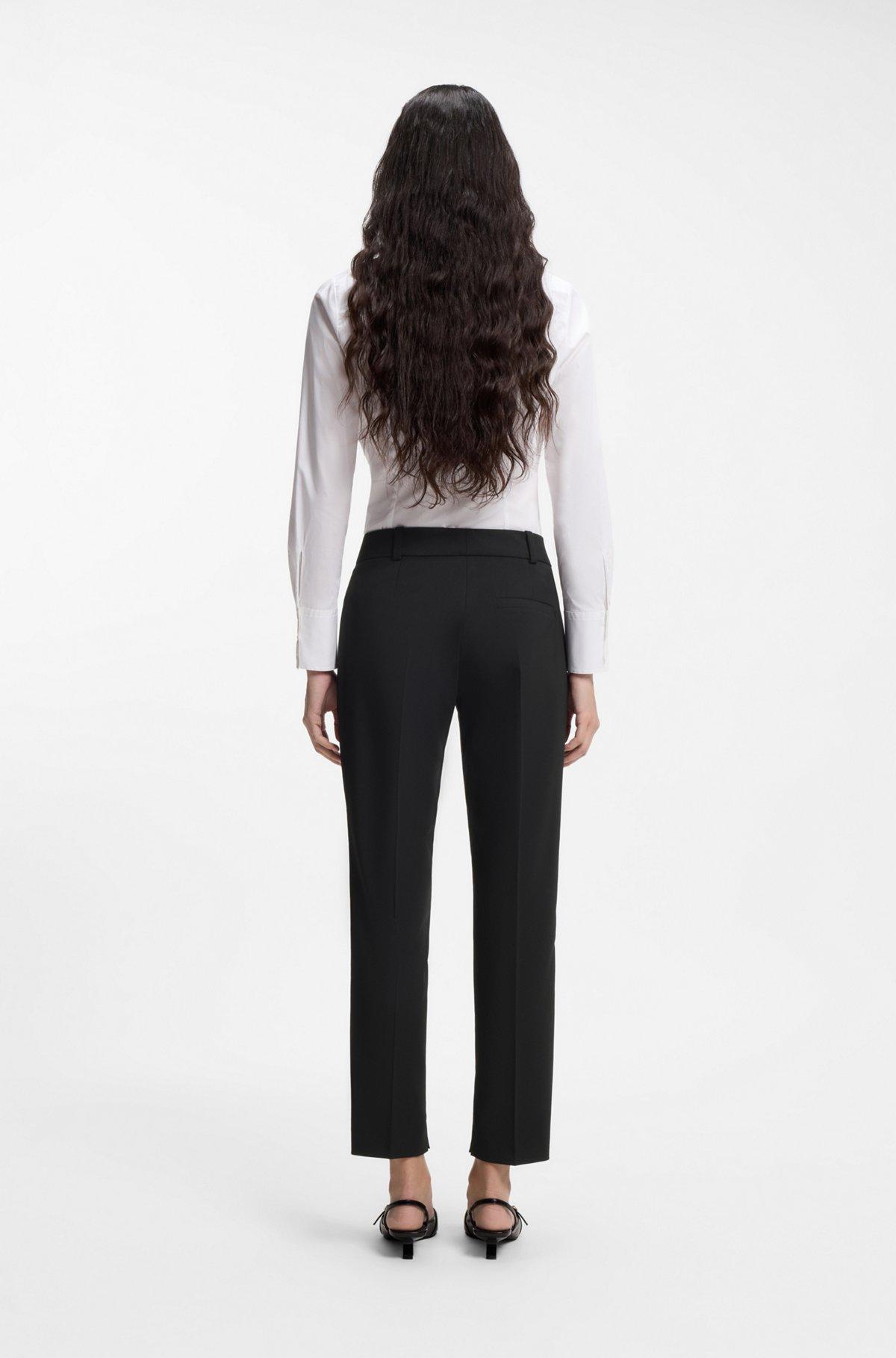 Blue-black tapered-fit jeans in stretch denim Product Image