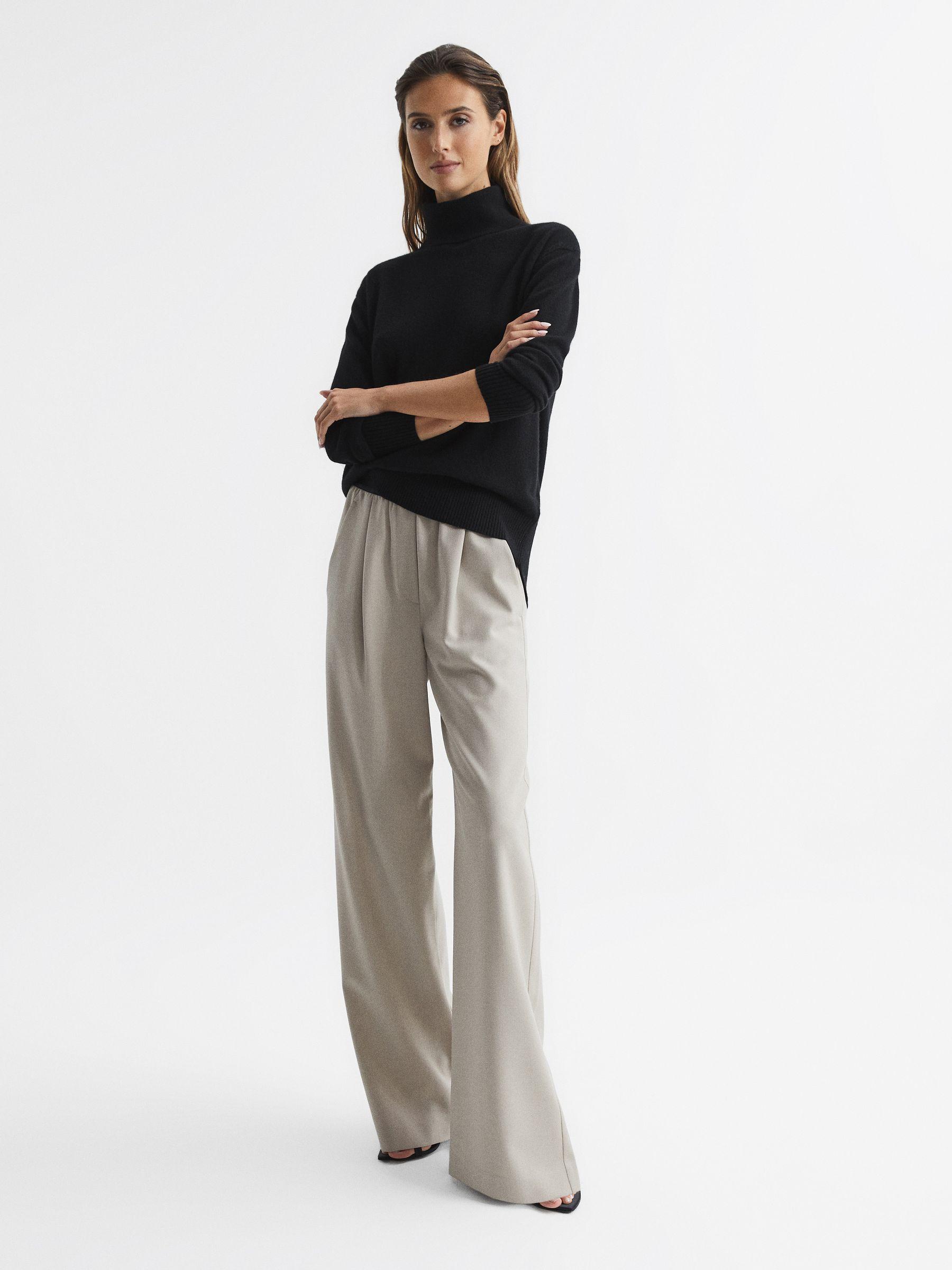 Cashmere Roll Neck Jumper in Black Product Image