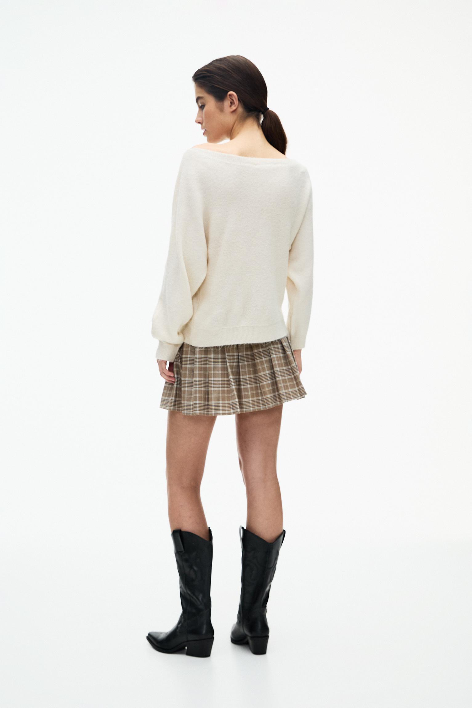 Asymmetric soft knit sweater Product Image
