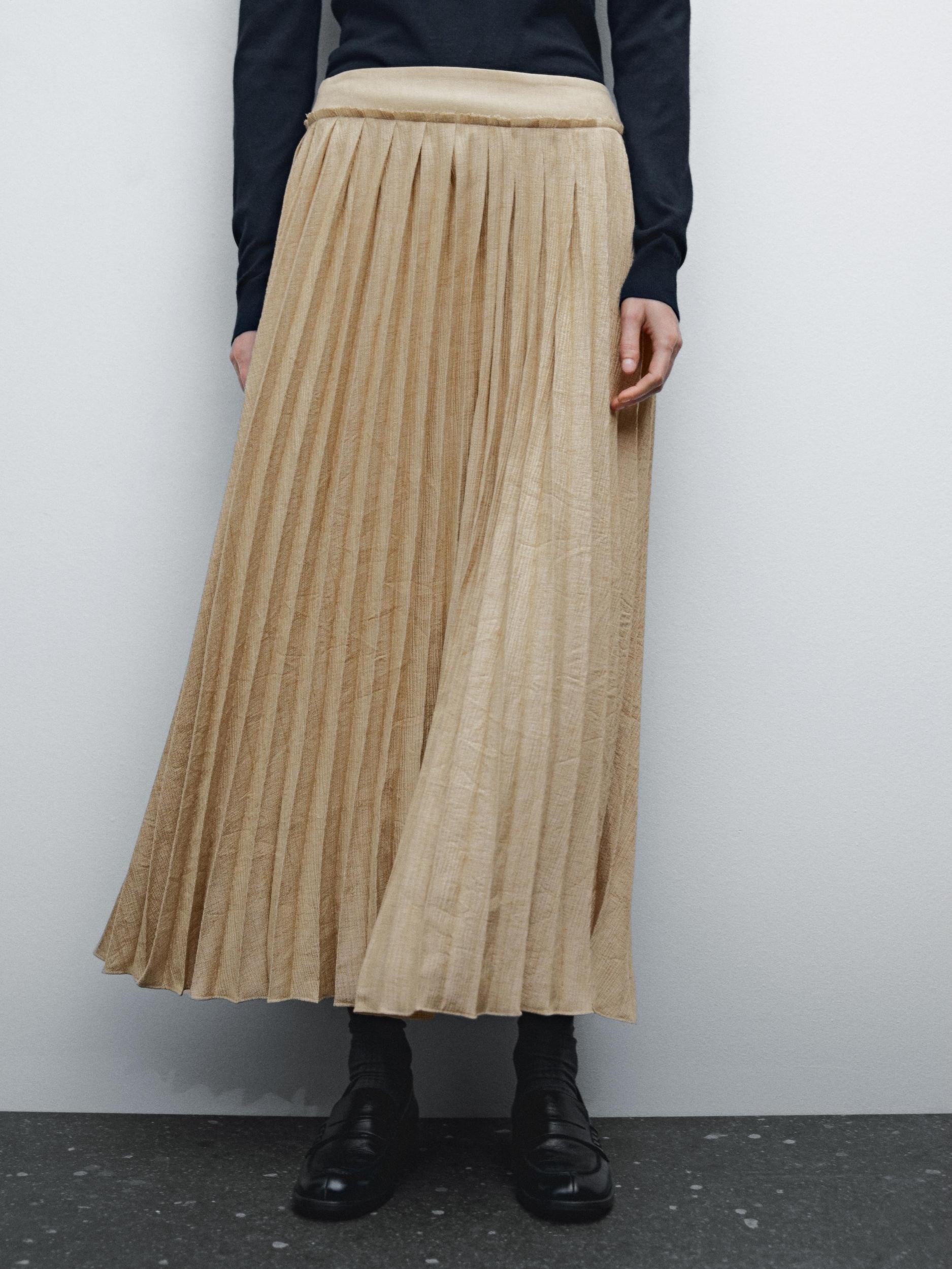 Pleated midi skirt with fabric detail Product Image