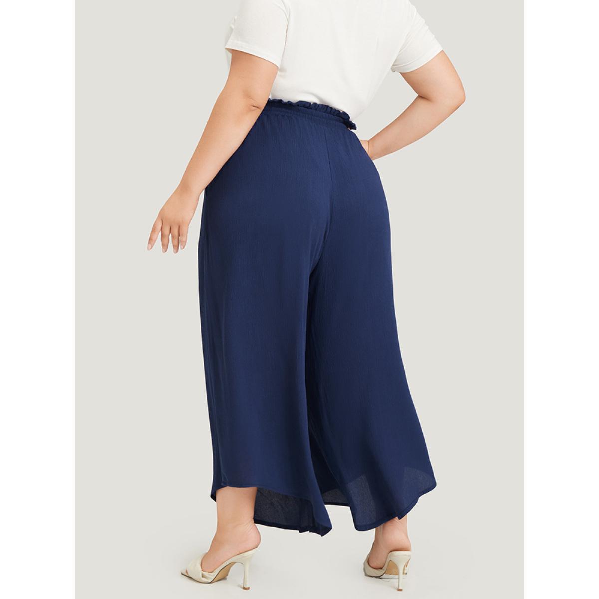 Plus Size Solid Paperbag Waist Asymmetrical Hem Wide Leg Pants Women Indigo Elegant High Rise Dailywear Pants BloomChic 12/L Product Image