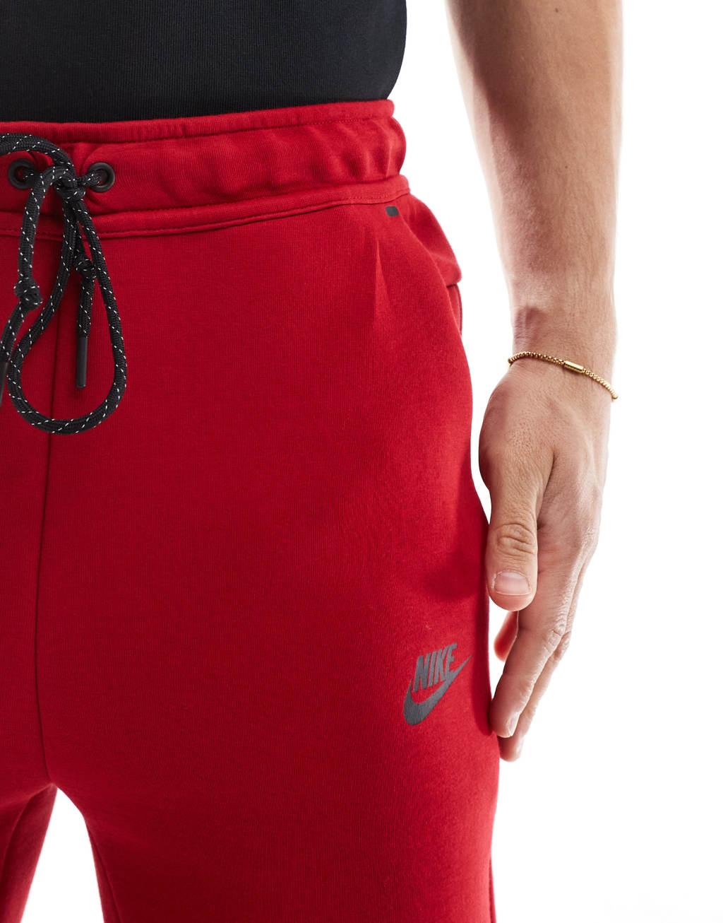 Nike Tech Fleece cuffed sweatpants in red Product Image