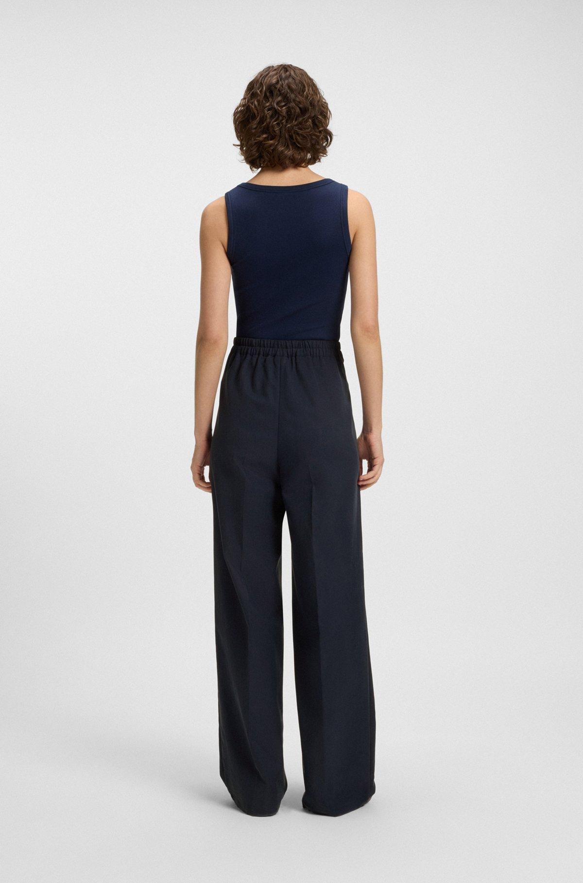 Formal trousers with pleat details Product Image