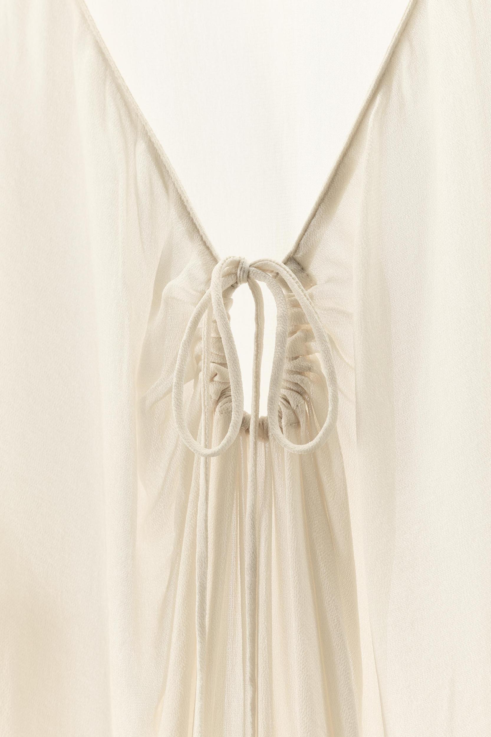 FLOWY SEMI-SHEER TOP Product Image