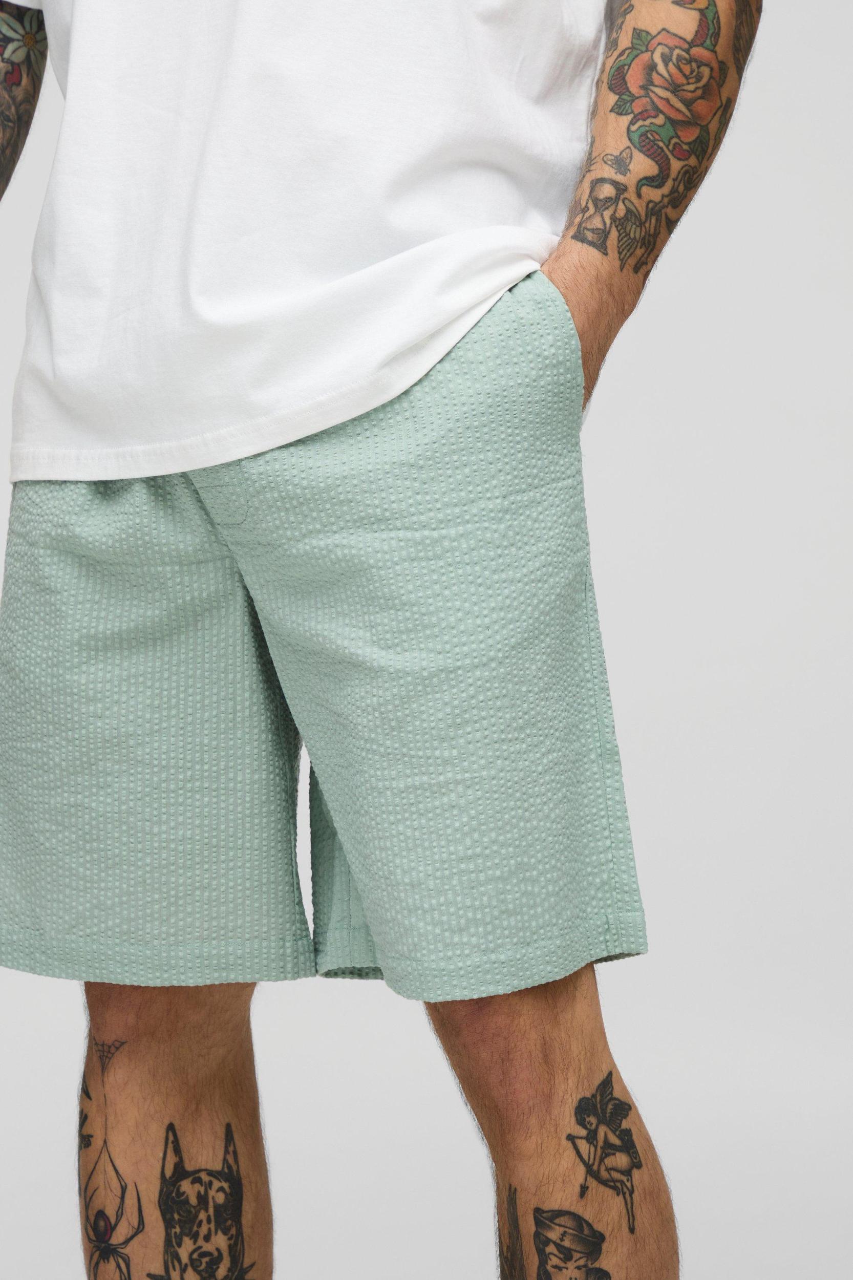 Elasticated Baggy Plain Seersucker Shorts | boohooMAN USA Product Image
