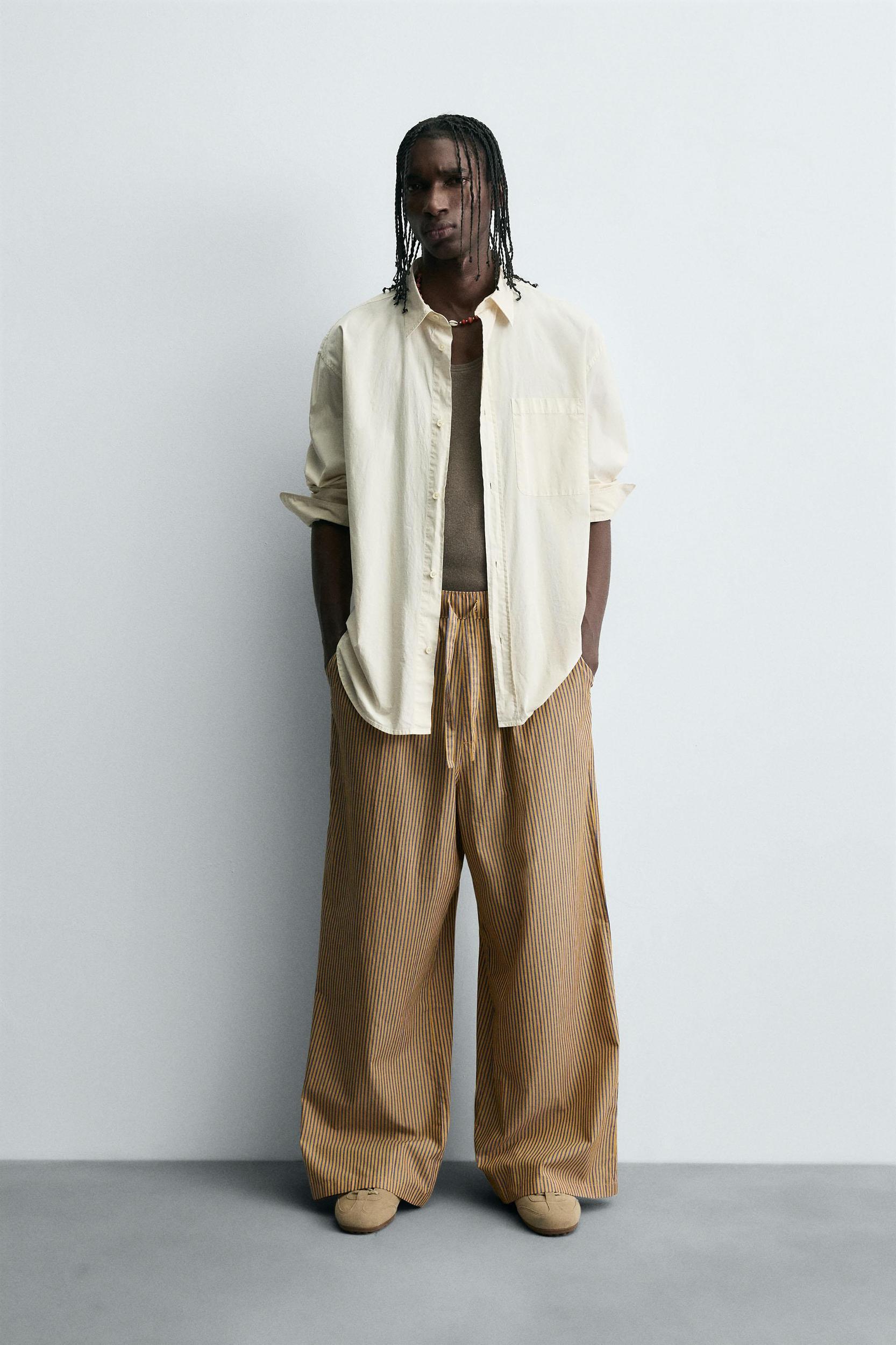 STRIPED OVERSIZED FIT PANTS Product Image