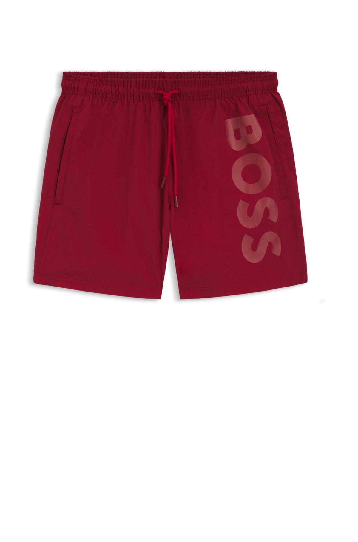Quick-dry swim shorts with vertical logo print Product Image