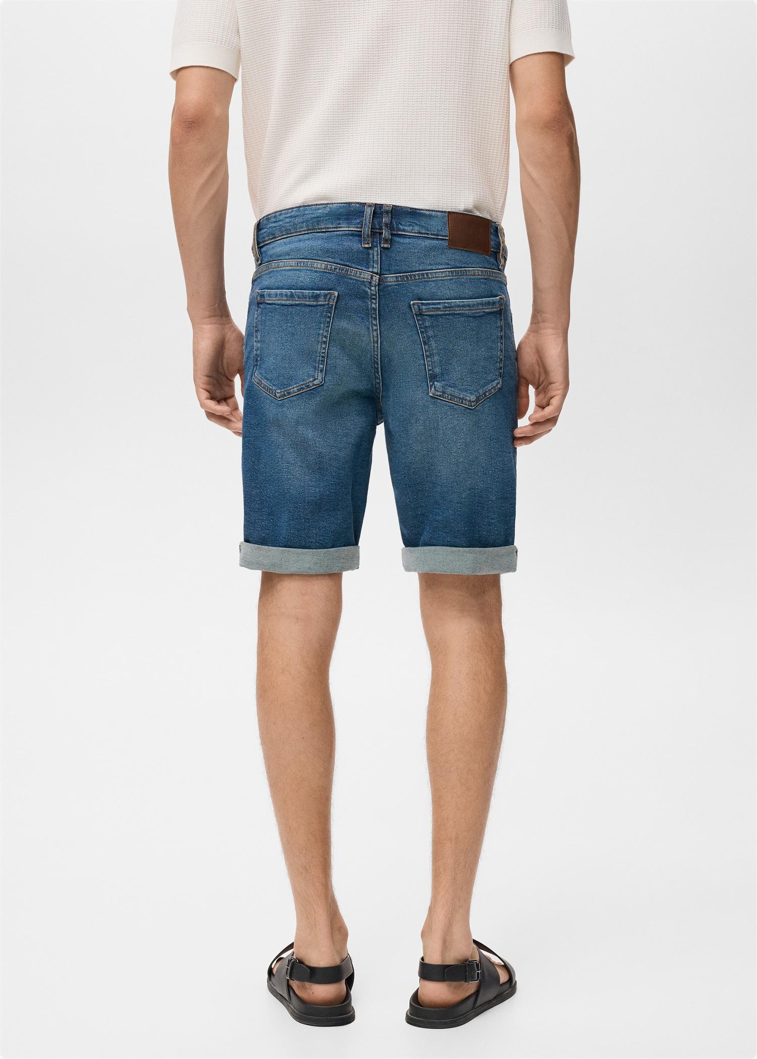 Slim-fit denim bermuda shorts - Men | MANGO USA Product Image