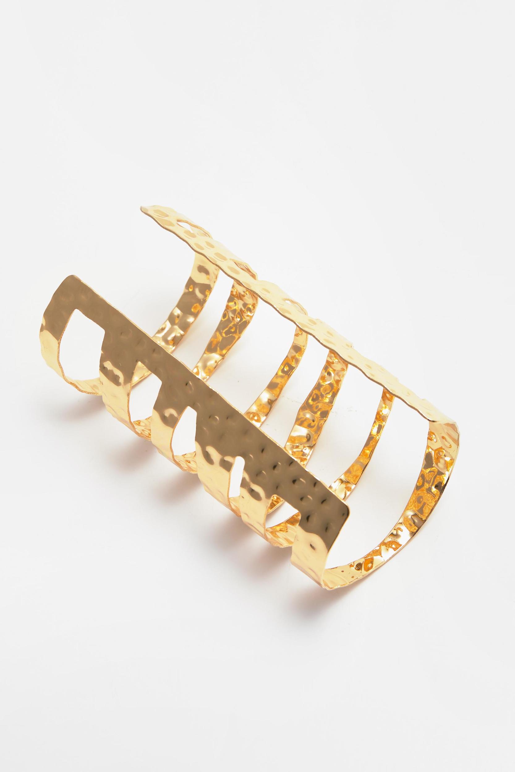 Cuff bracelet with metal openings Product Image