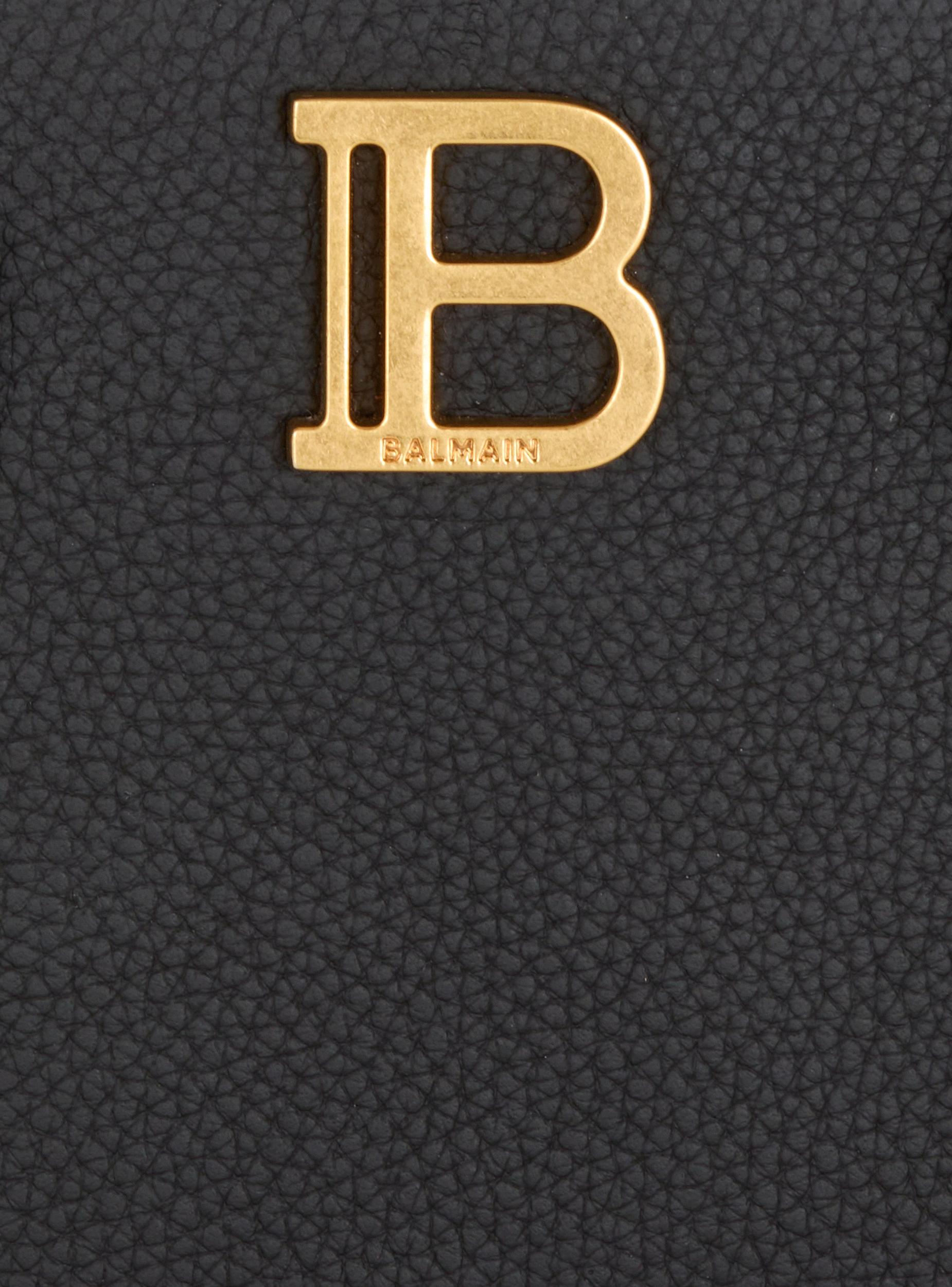 Small B-Buzz Top Handle bag in grained leather Product Image
