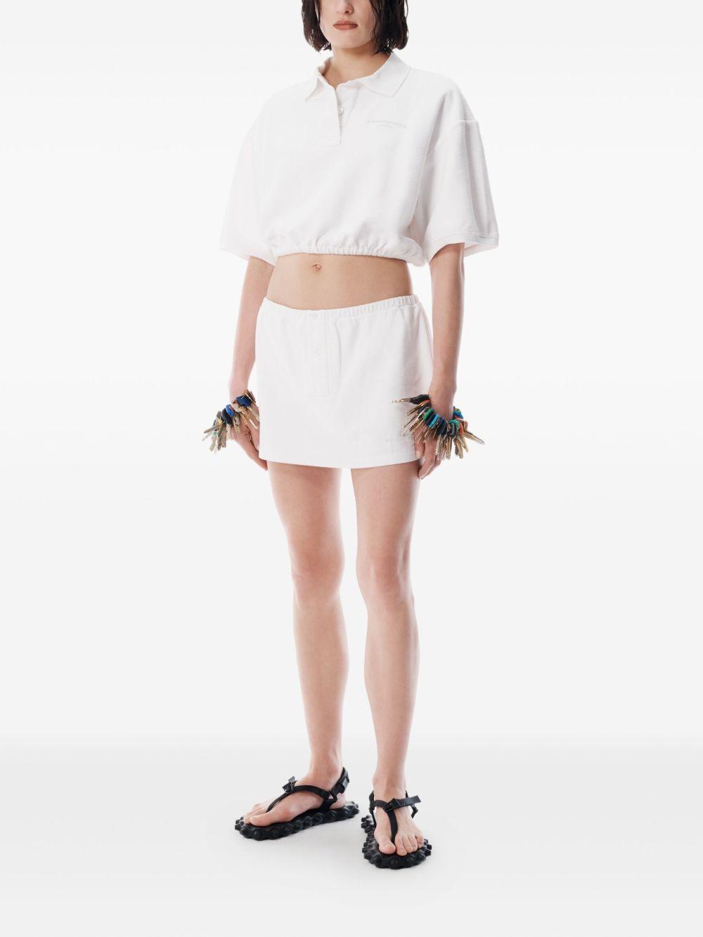 elasticated-hem cropped polo top Product Image