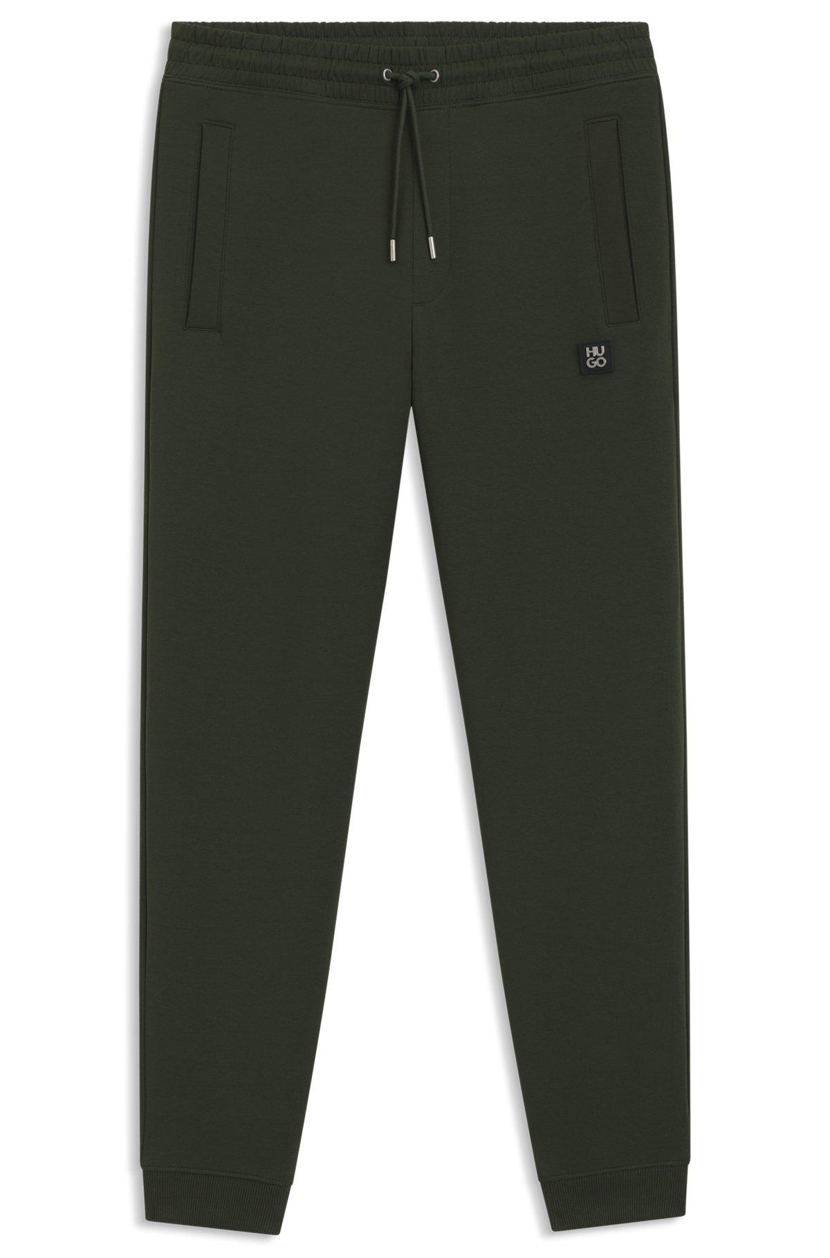 HUGO - Cotton tracksuit bottoms with stacked logo - Dark Green Product Image
