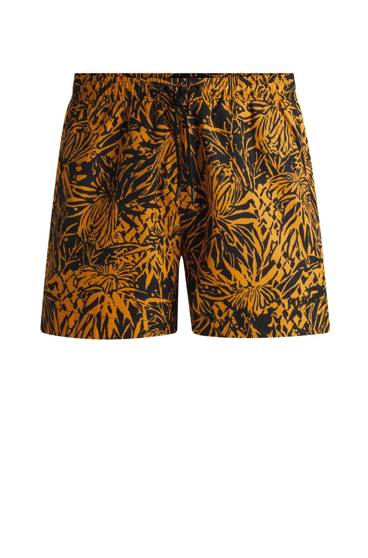 HUGO - Fully lined swim shorts with seasonal print - Black Product Image