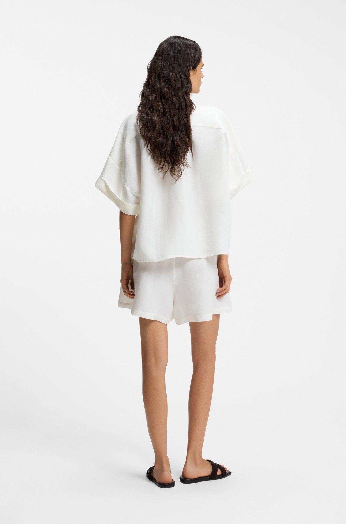 Regular-fit blouse with rolled cuffs Product Image