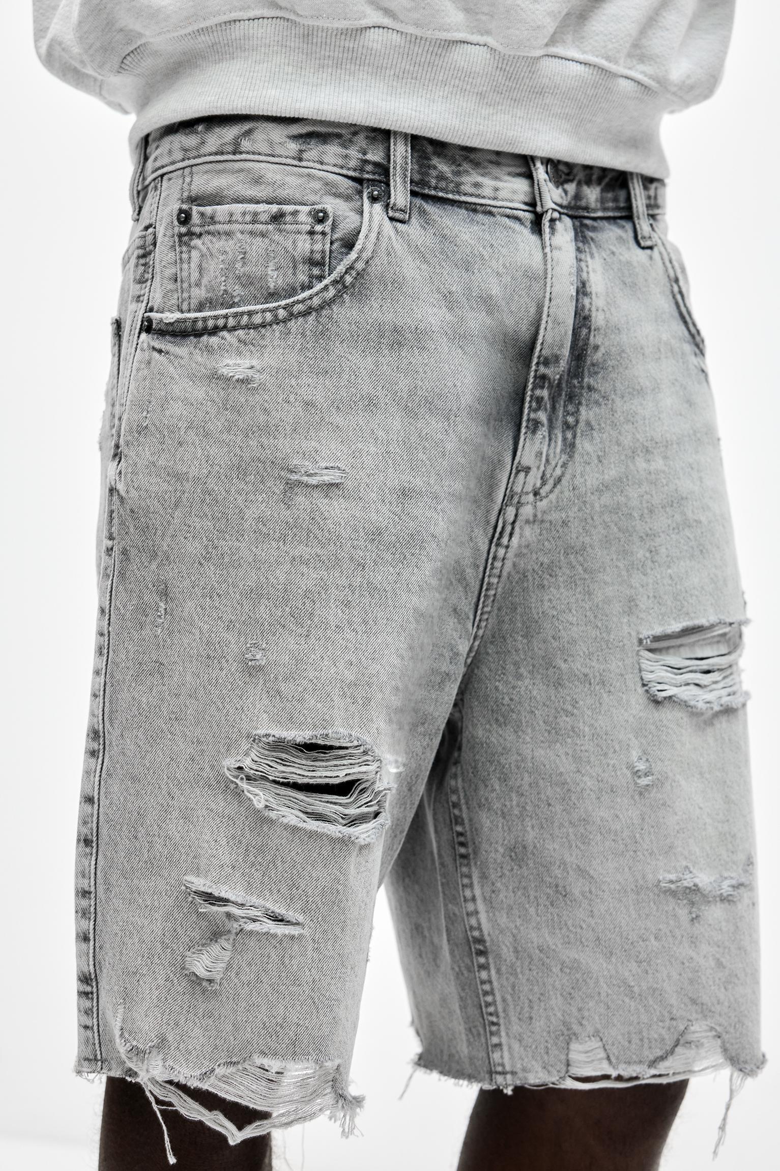 Ripped straight fit denim Bermuda shorts Product Image