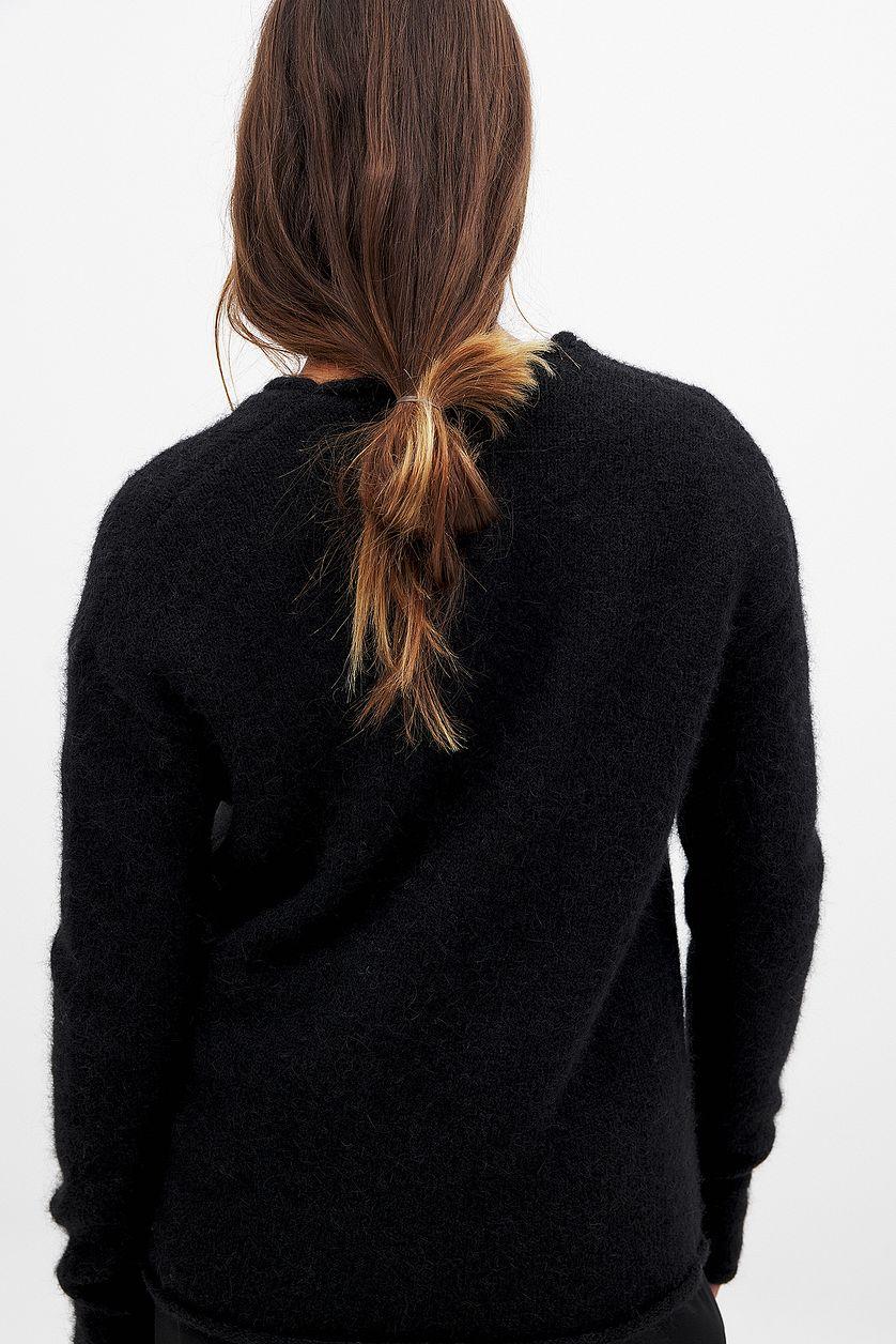 Knitted Deep V-neck Wool Blend Sweater Product Image