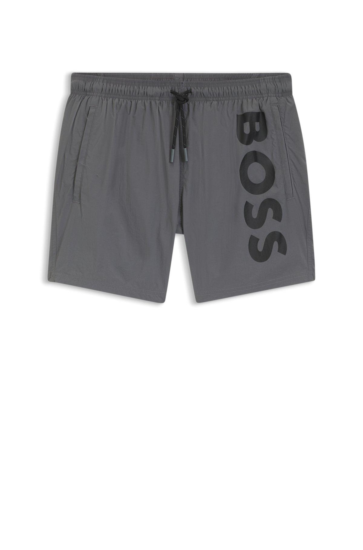 Quick-dry swim shorts with vertical logo print Product Image