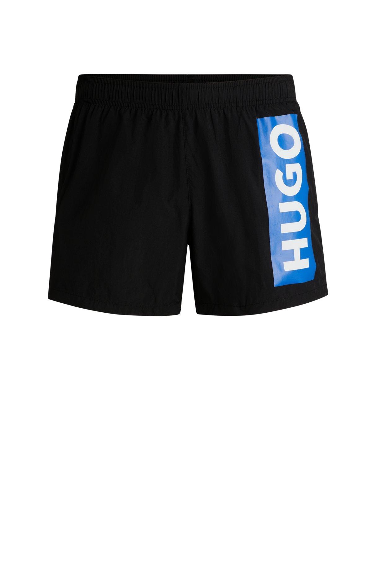 Partially lined quick-dry swim shorts with vertical logo Product Image